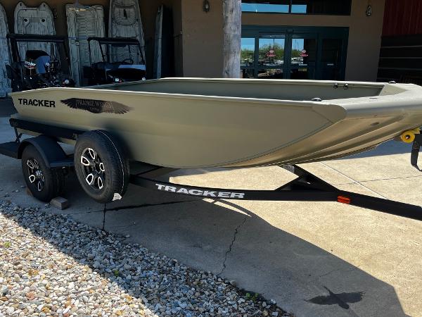 2025 Tracker Grizzly 1650 T Prairie Wings Edition boat on trailer, outdoor display.
