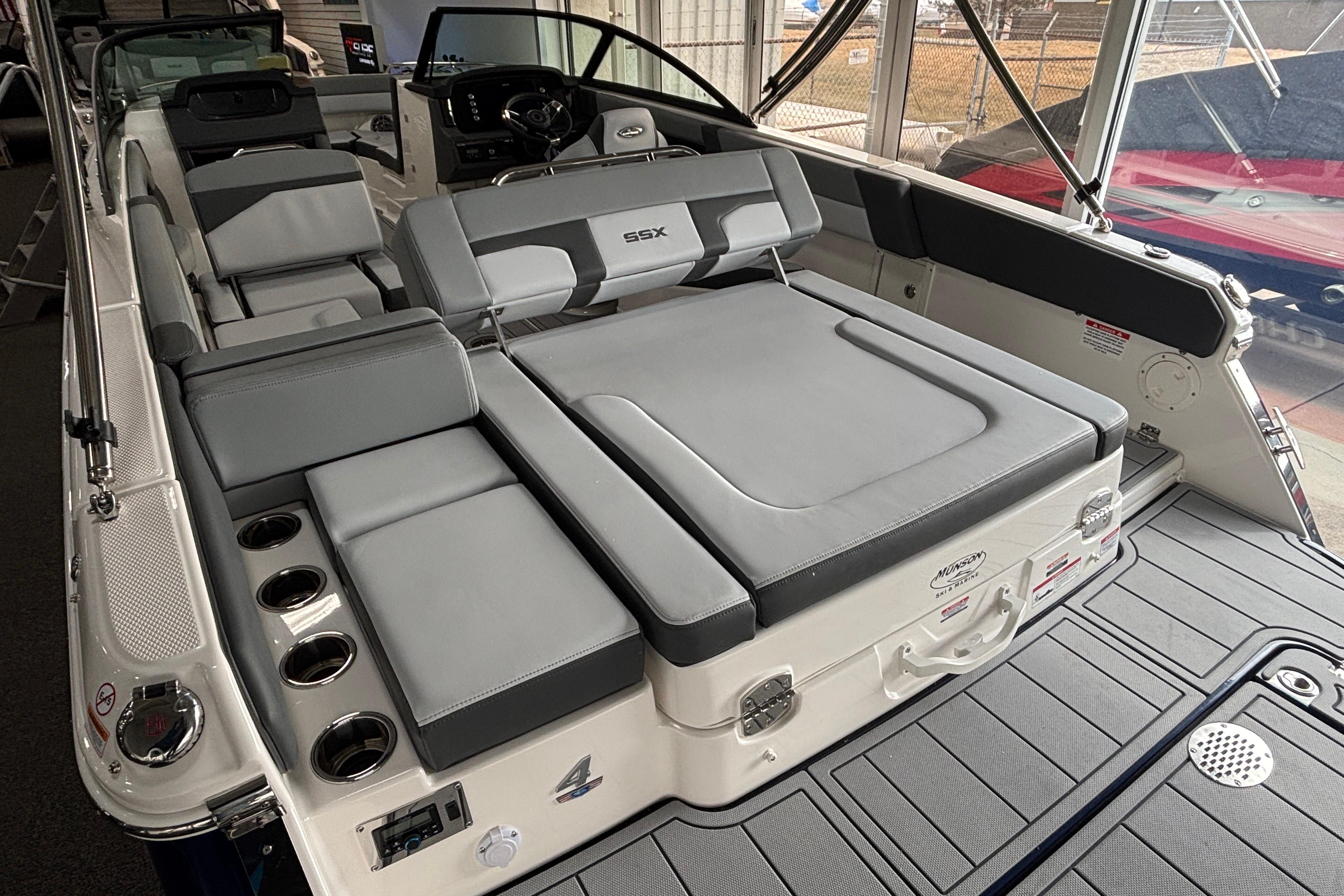 2026 Chaparral SSX 4 boat interior with gray seating and modern design.