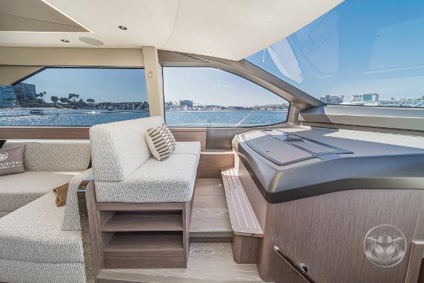 Luxurious interior of 2025 Sunseeker Manhattan 68 yacht with panoramic ocean view.