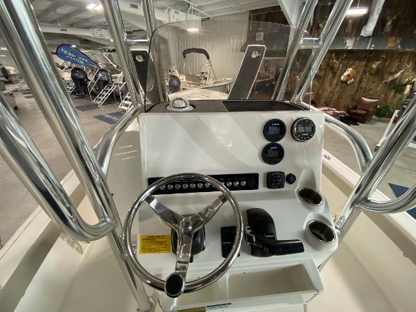 2024 Key West 250 Bay Reef boat console with steering wheel and controls.
