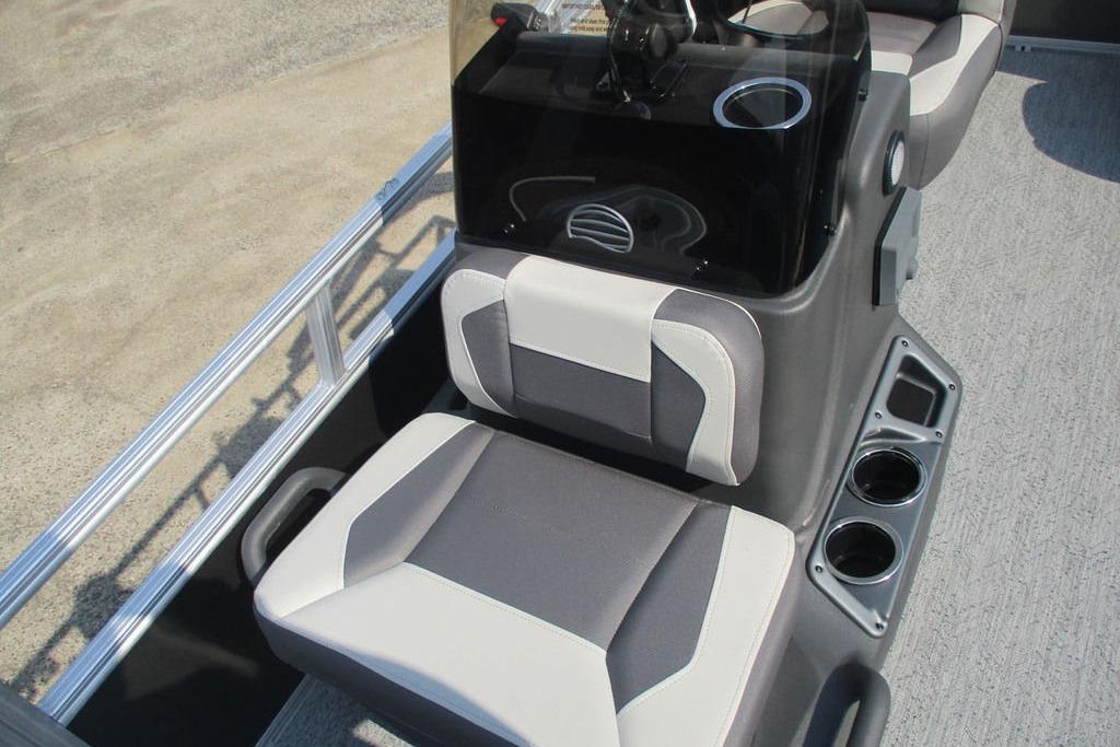 2026 Sun Tracker Bass Buggy 16 XL Select boat seat with cup holders and console.