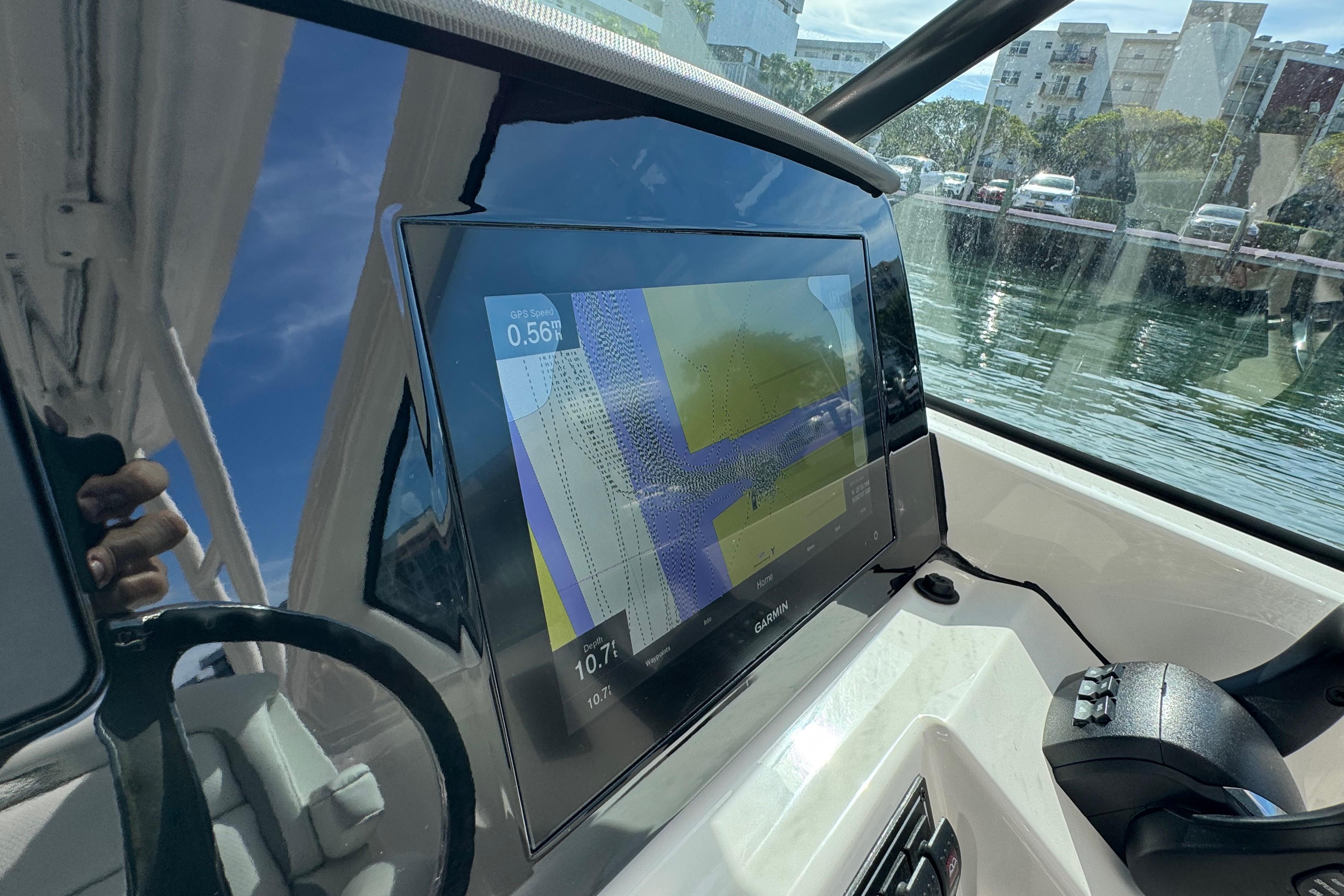 2022 Pursuit DC 266 Dual Console boat dashboard with Garmin navigation display.