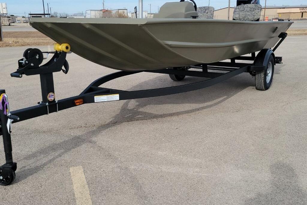 2026 Tracker Grizzly 1754 SC boat on trailer in parking lot.