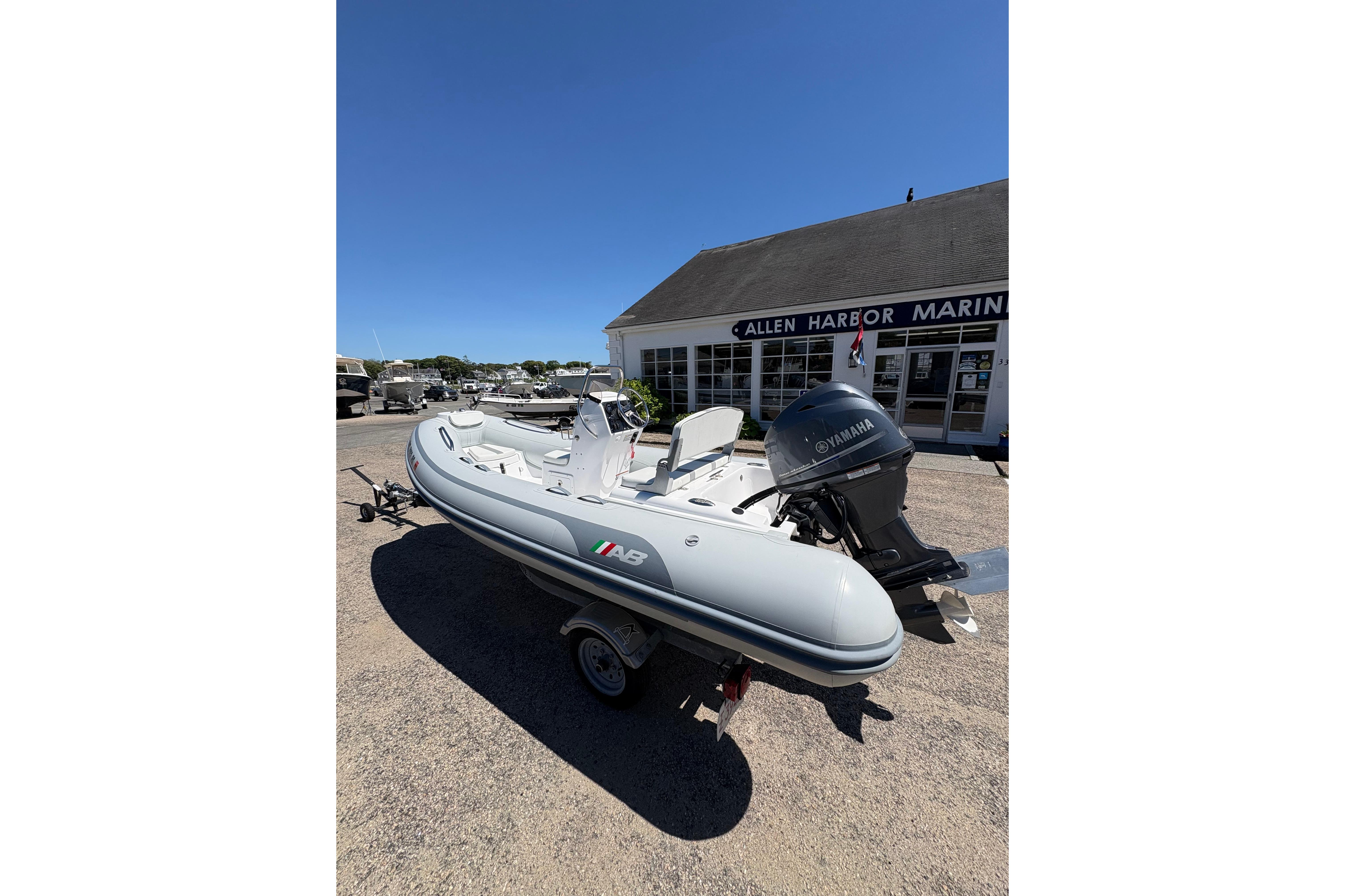 2022 AB Inflatables Oceanus 14 VST boat with Yamaha engine at marina.
