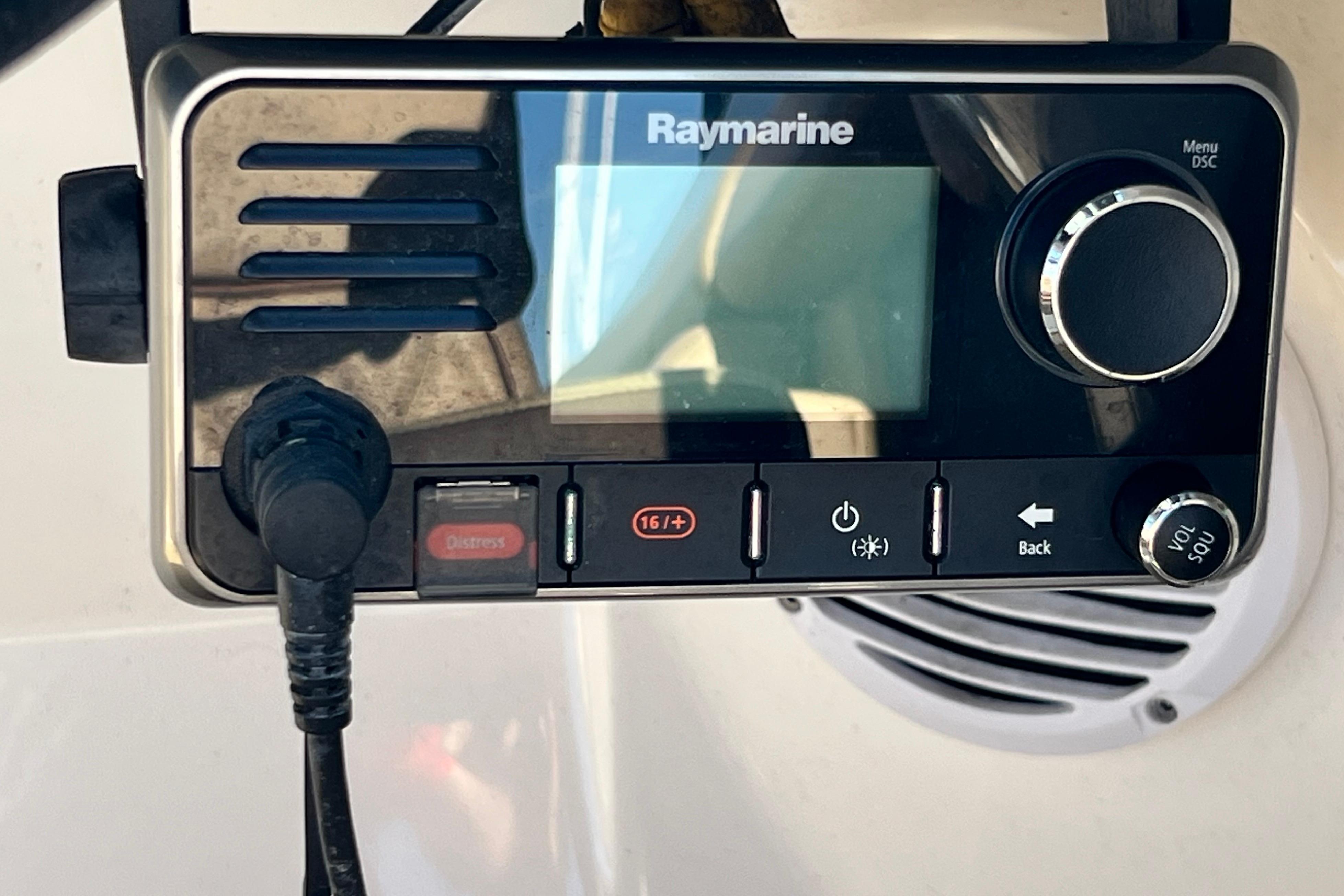 Raymarine marine radio on 2016 Sea Ray 290 Sundeck Outboard boat dashboard.