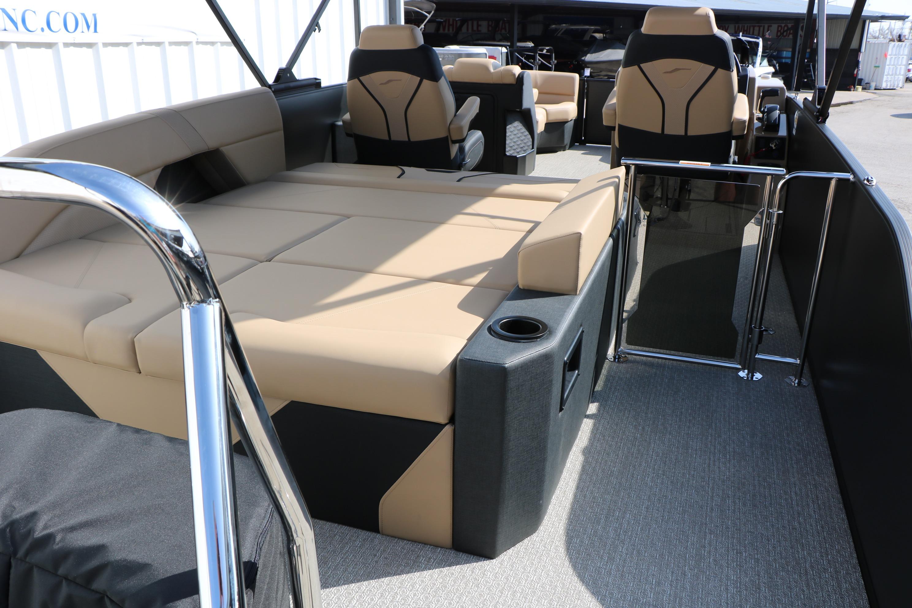 Luxurious interior of 2026 Evotti 723CS boat with beige seating and modern design.
