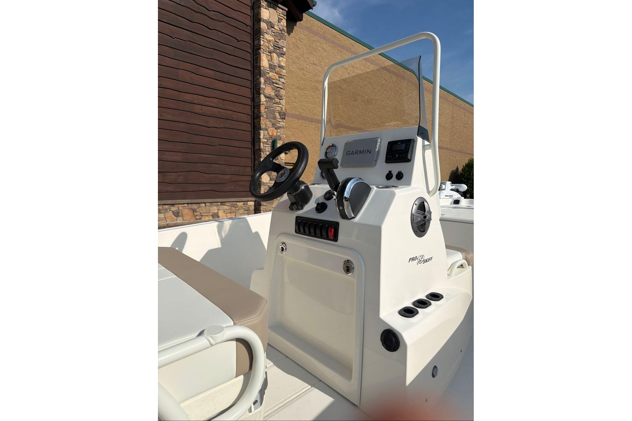 2026 Mako Pro Skiff 19 CC boat console with Garmin navigation system.