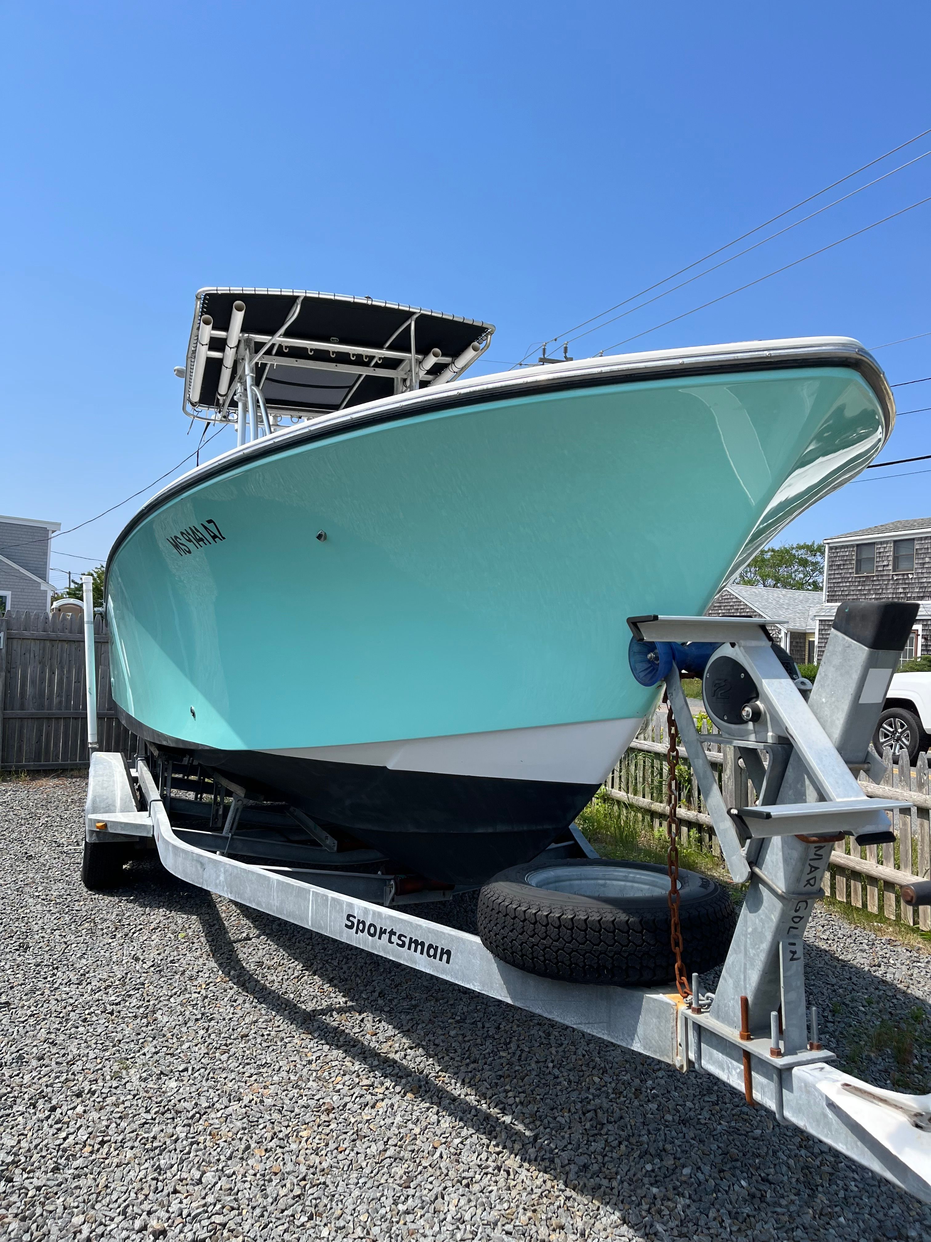 SeaCraft SXCRB730H001 2001 on trailer, blue sky.