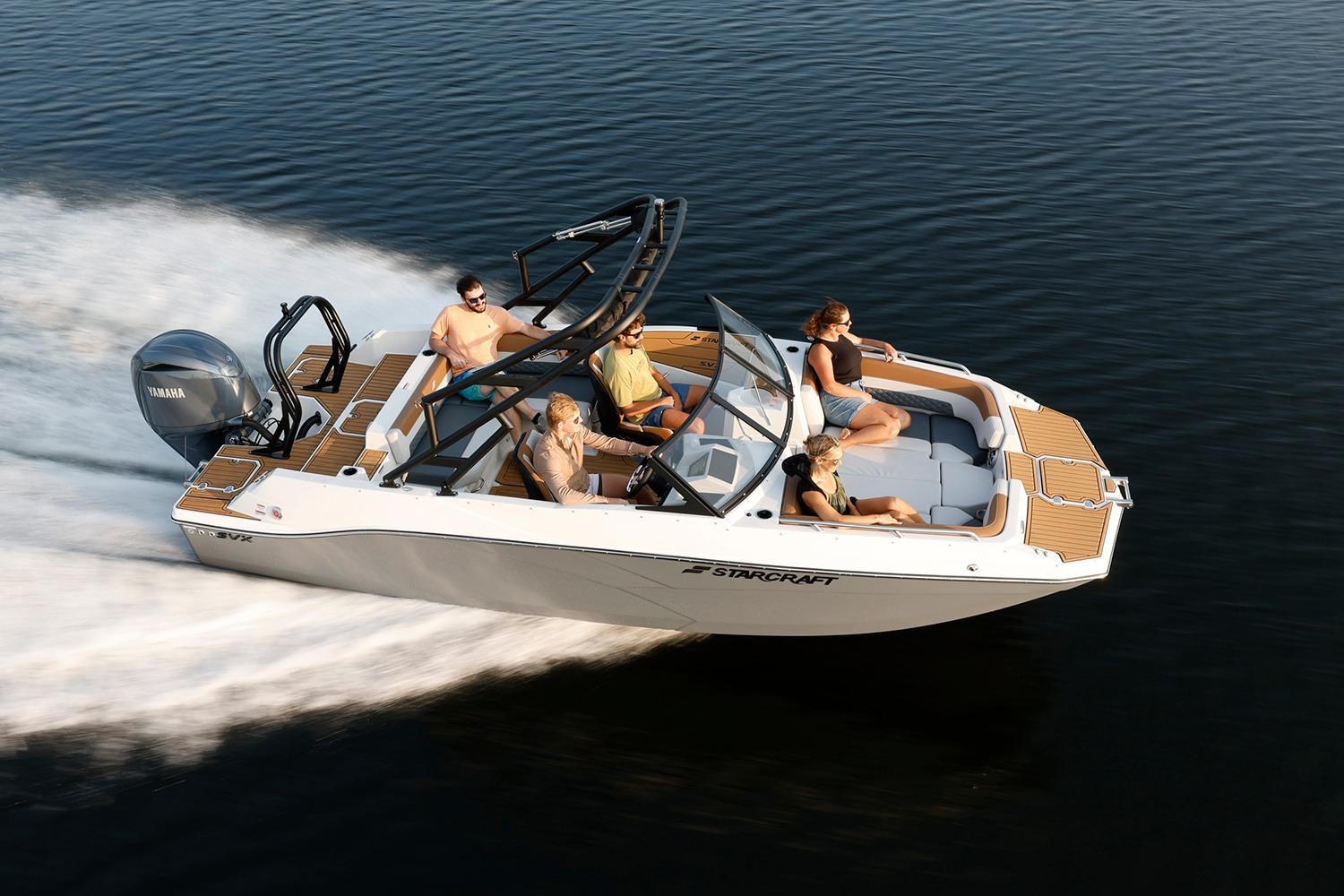 Manufacturer Provided Image: 2026 Starcraft SVX 210 DC OB boat cruising on water with passengers enjoying the ride.