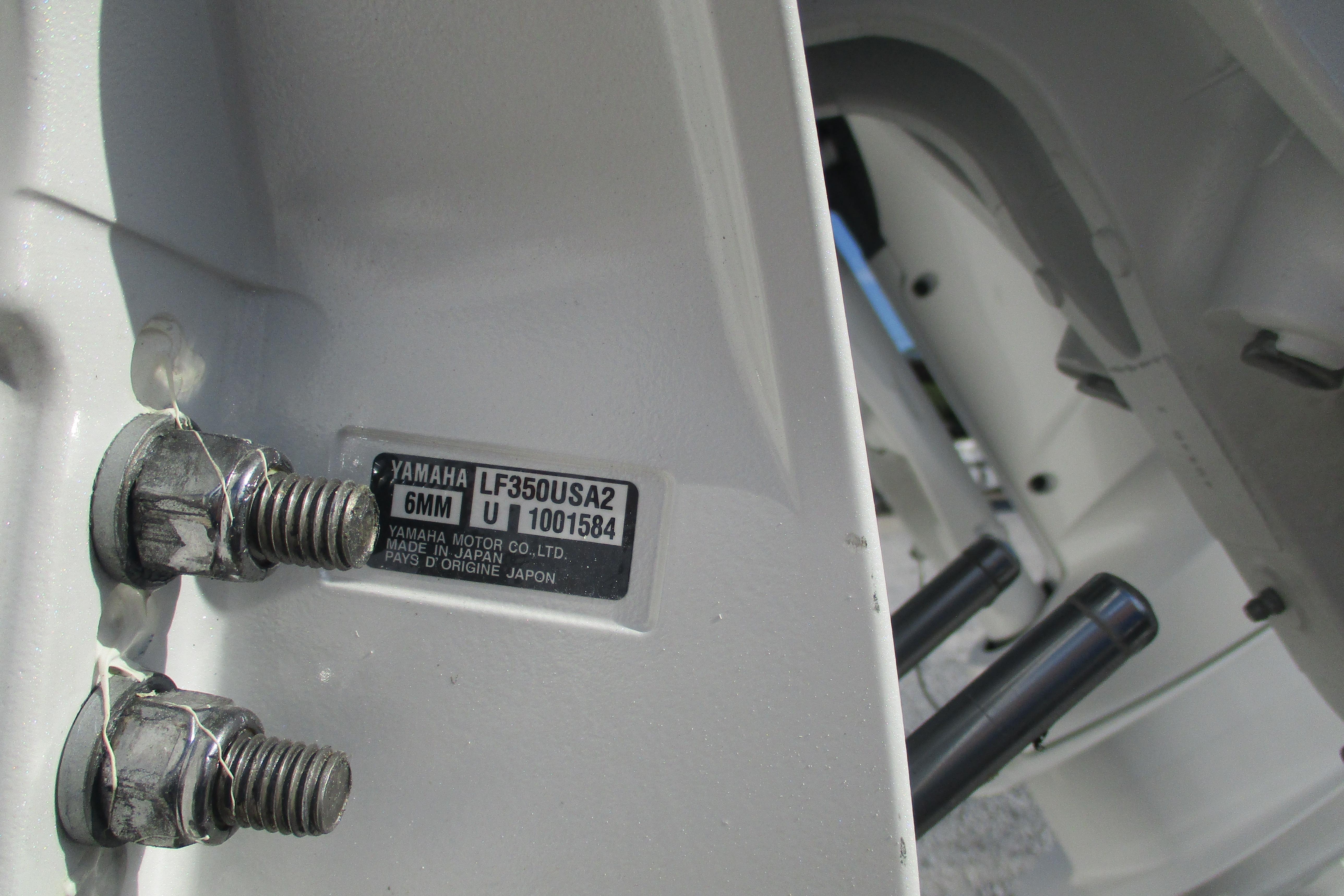 Close-up of Yamaha LF350USA2 engine bolts on 2026 Sea Fox 328 Commander.