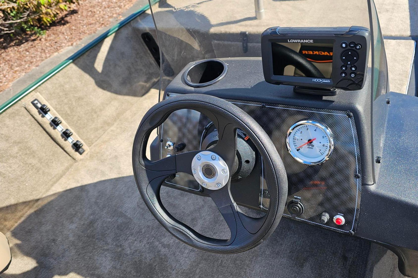 Steering console of 2026 Tracker Bass Tracker Classic Limited with Lowrance fish finder.