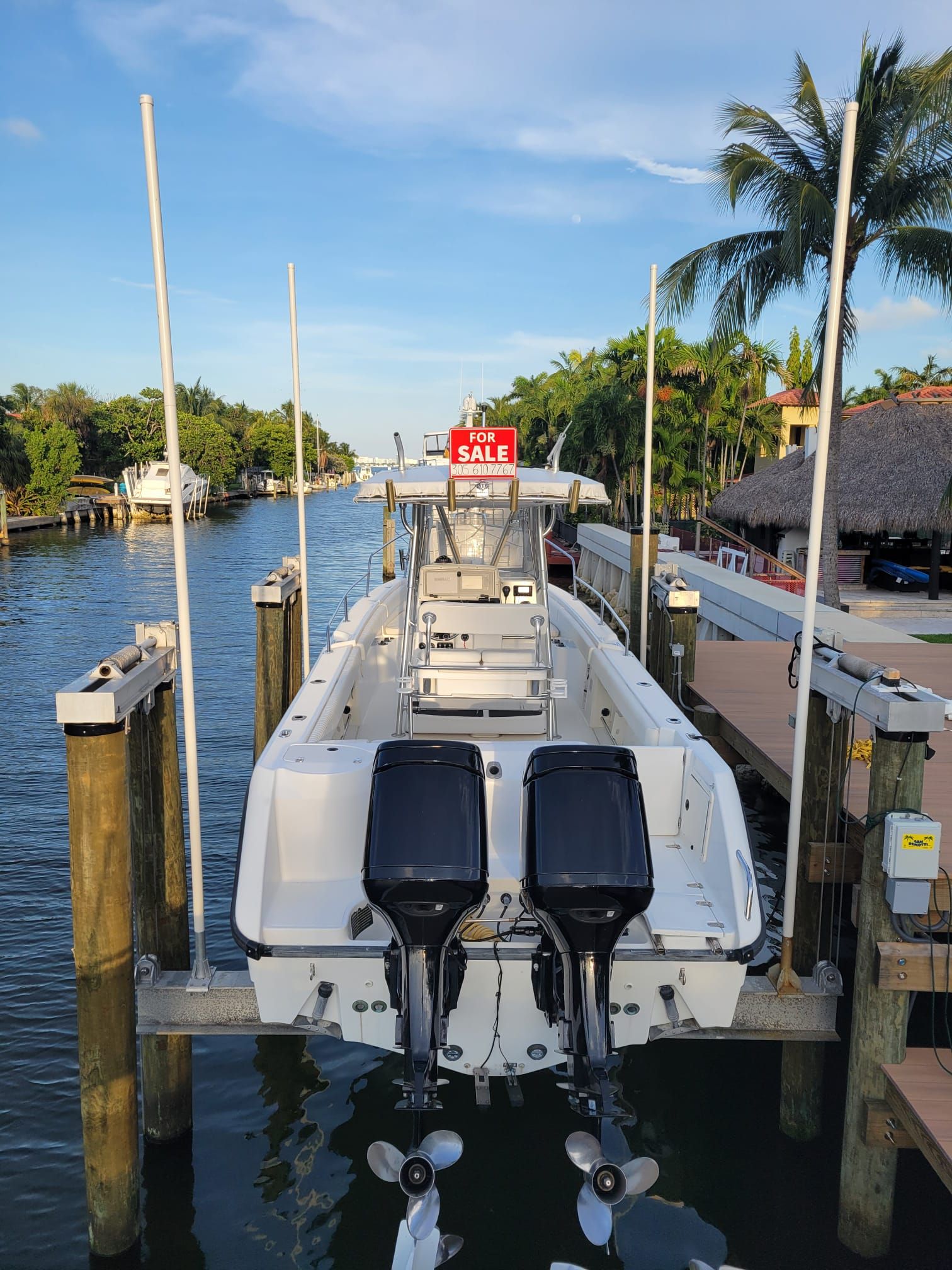 2001 Boston Whaler 26 Outrage boat for sale at dock.