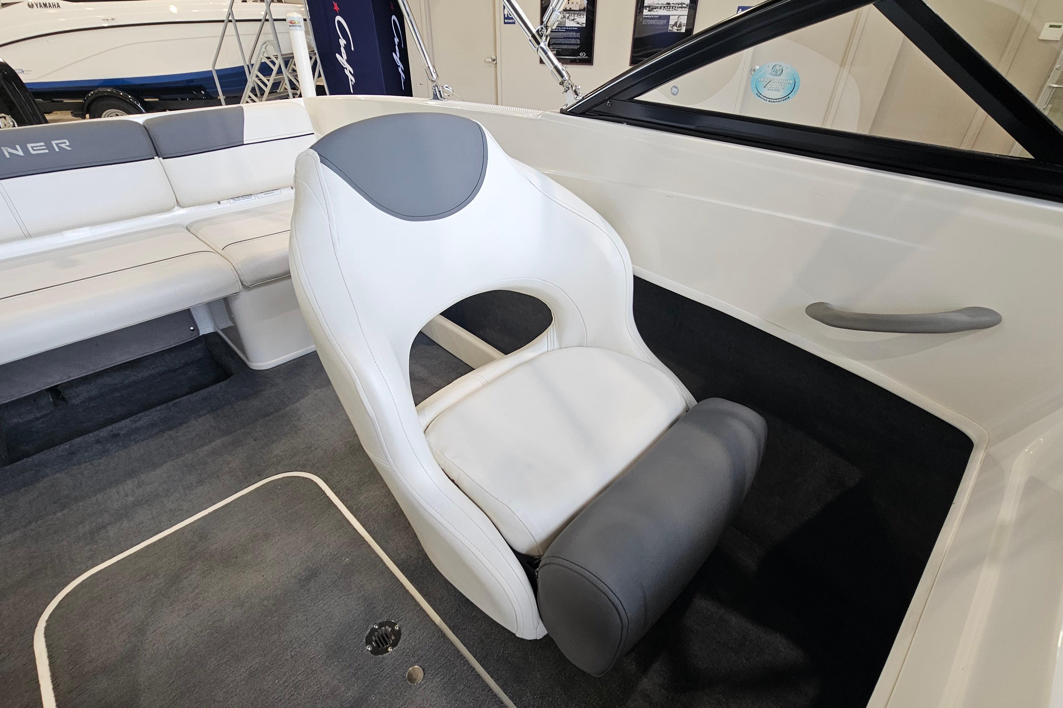 2019 Bayliner 170 Bowrider interior with white and gray seating, showcasing modern design.