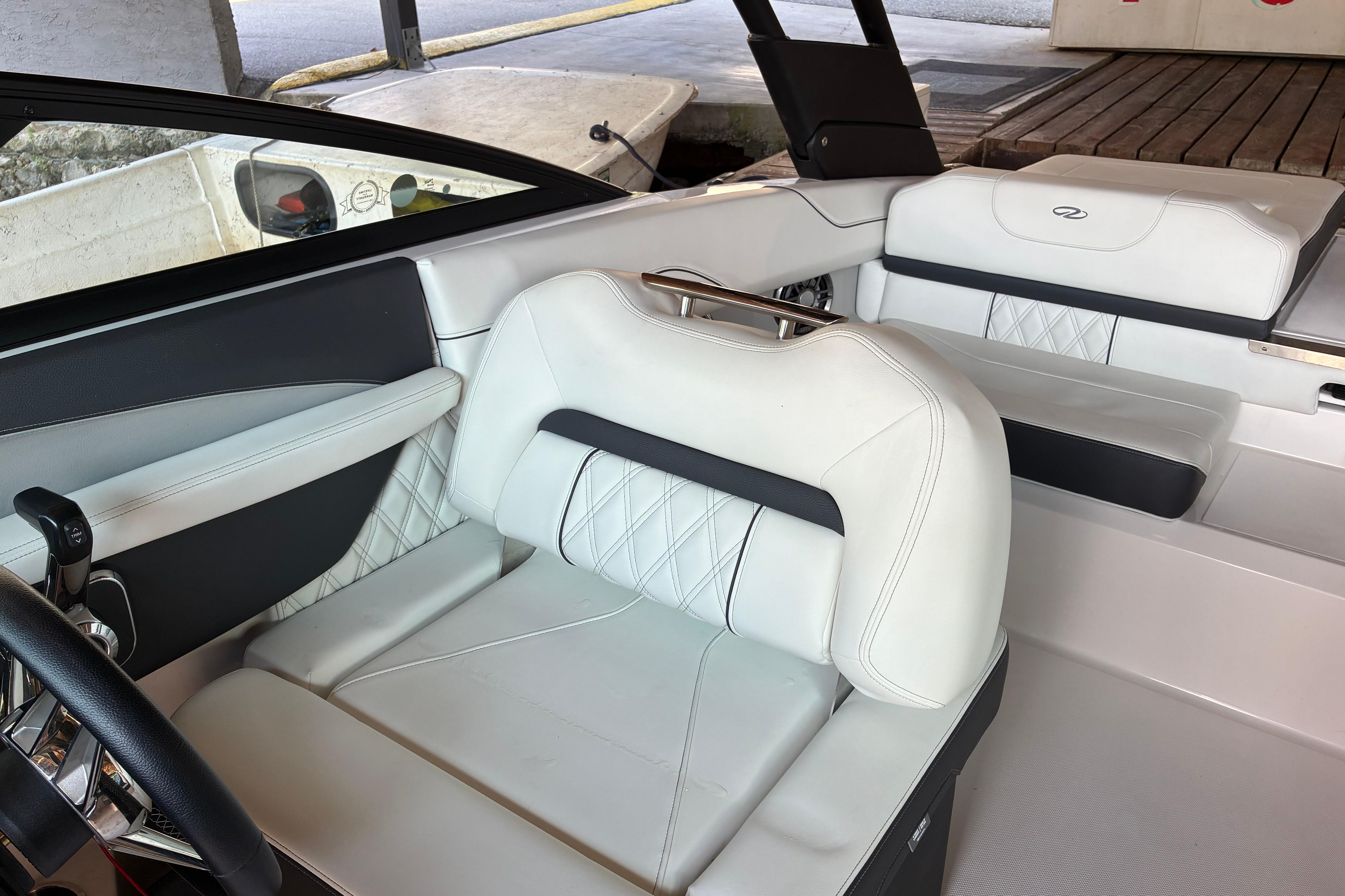 2025 Regal LS2 boat interior with luxurious white leather seating and modern design.