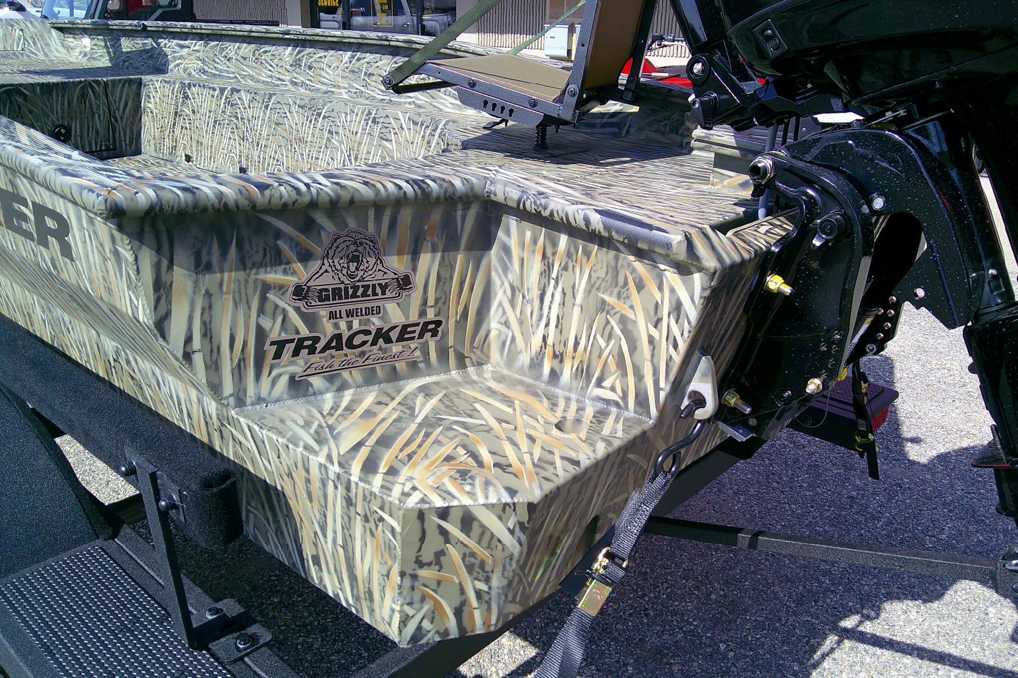2026 Tracker Grizzly 1650 T Prairie Wings Edition boat with camouflage design.