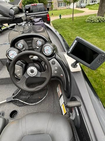 The image shows the cockpit of a 2020 Bass Tracker Pro 175TXW with a Lowrance fish finder.