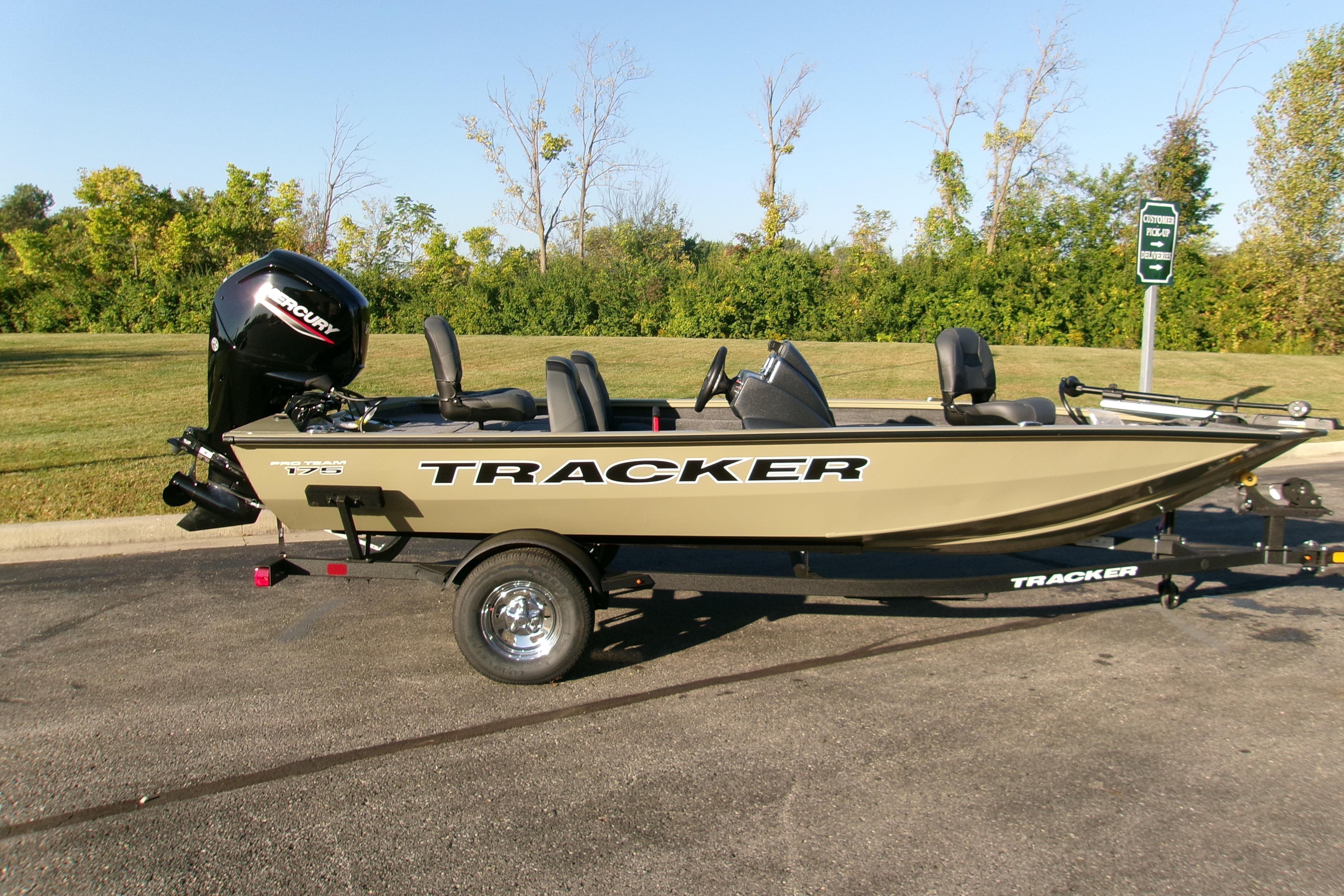 2026 Tracker Pro Team 175 Crappie Edition boat on trailer, parked outdoors.