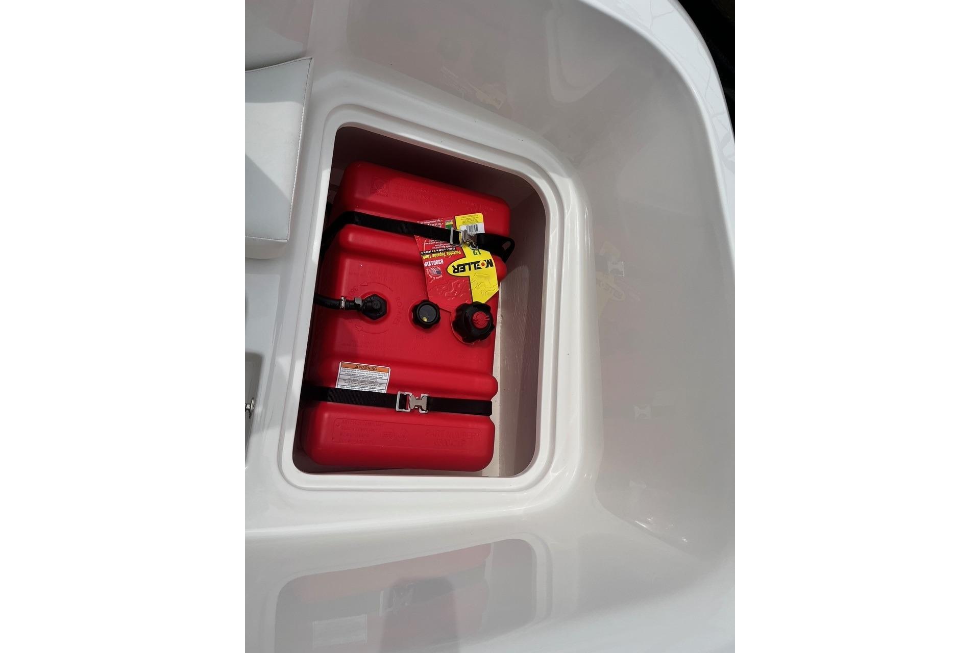 Red fuel tank in Bayliner Element E16 boat, year 2026.