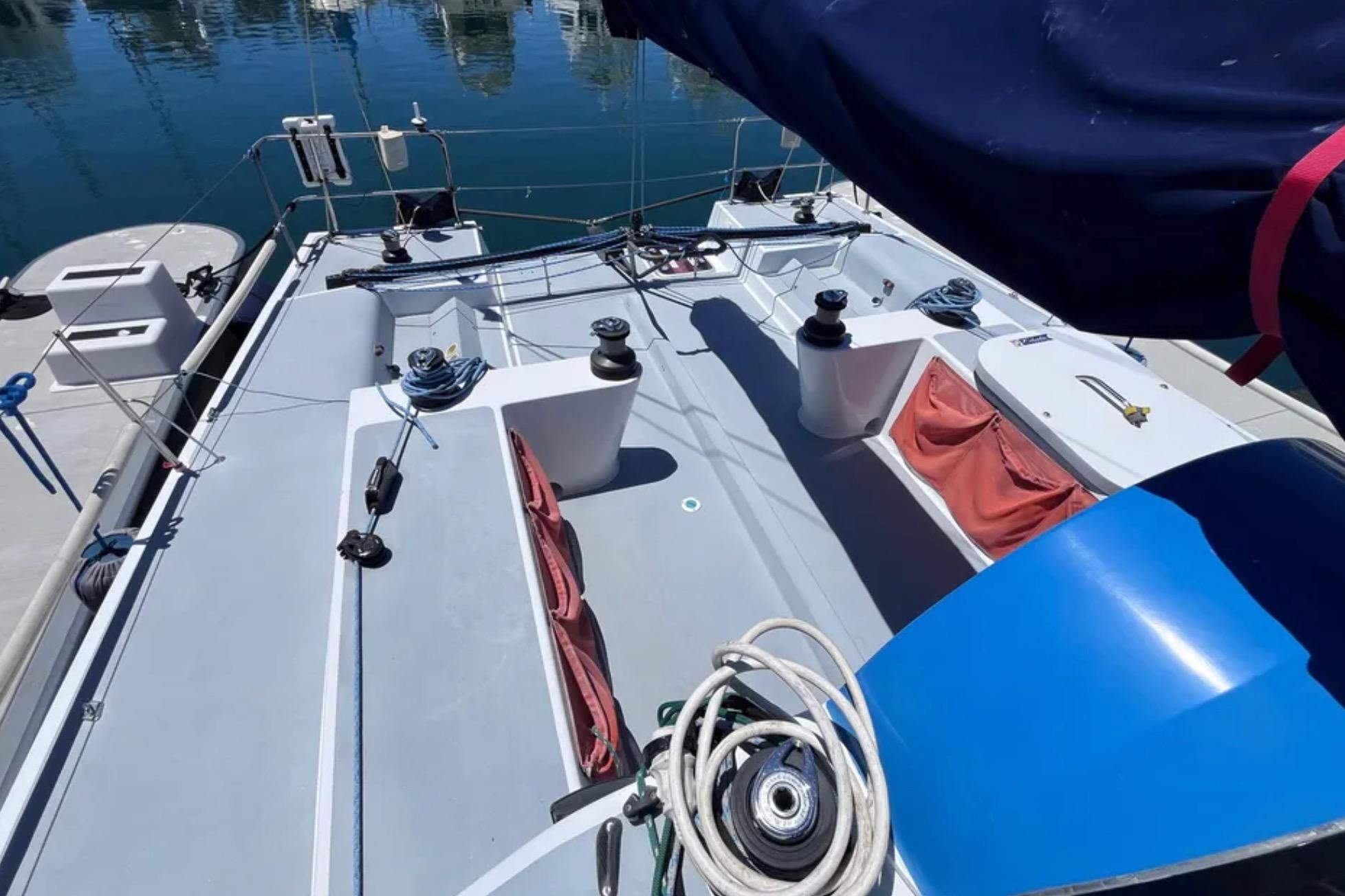 2009 Class 40 Open Antrim Design sailboat deck with winches and ropes.
