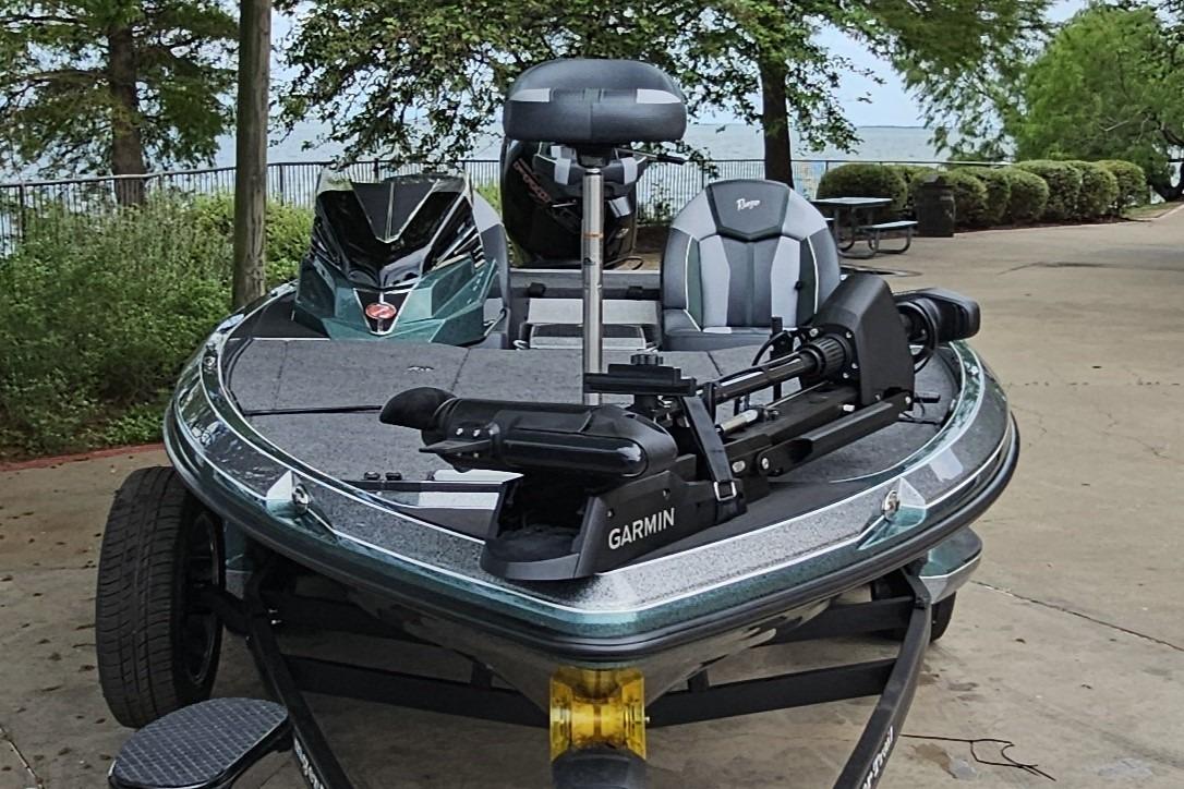 2026 Ranger Z519R Cup-Equipped boat with Garmin technology, parked outdoors.