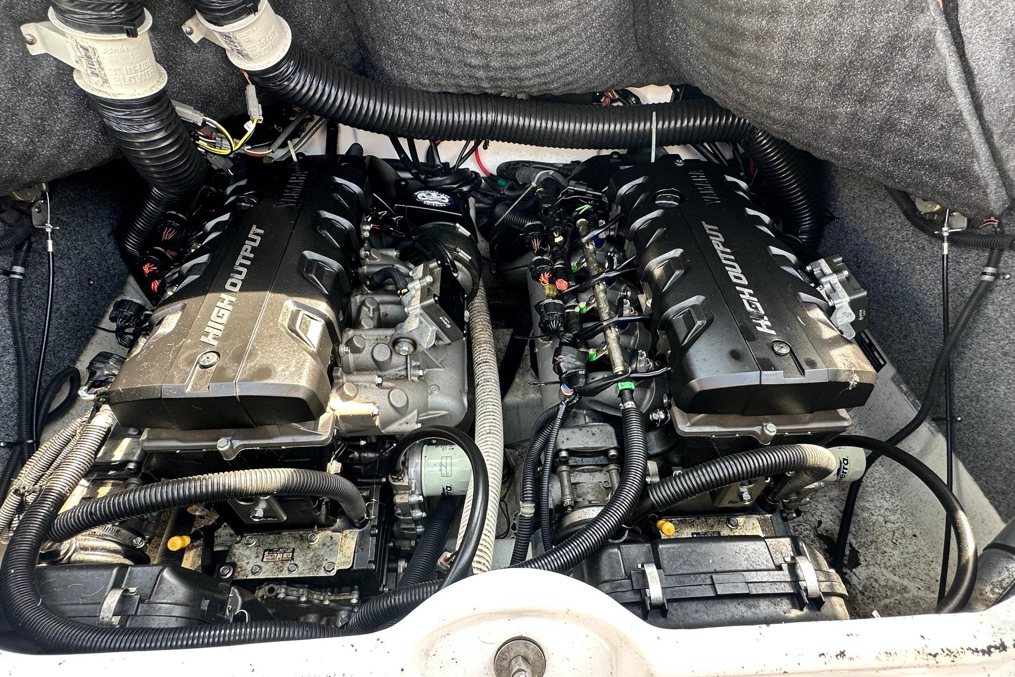 2016 Yamaha 242 Limited S engine compartment with dual high-output engines.