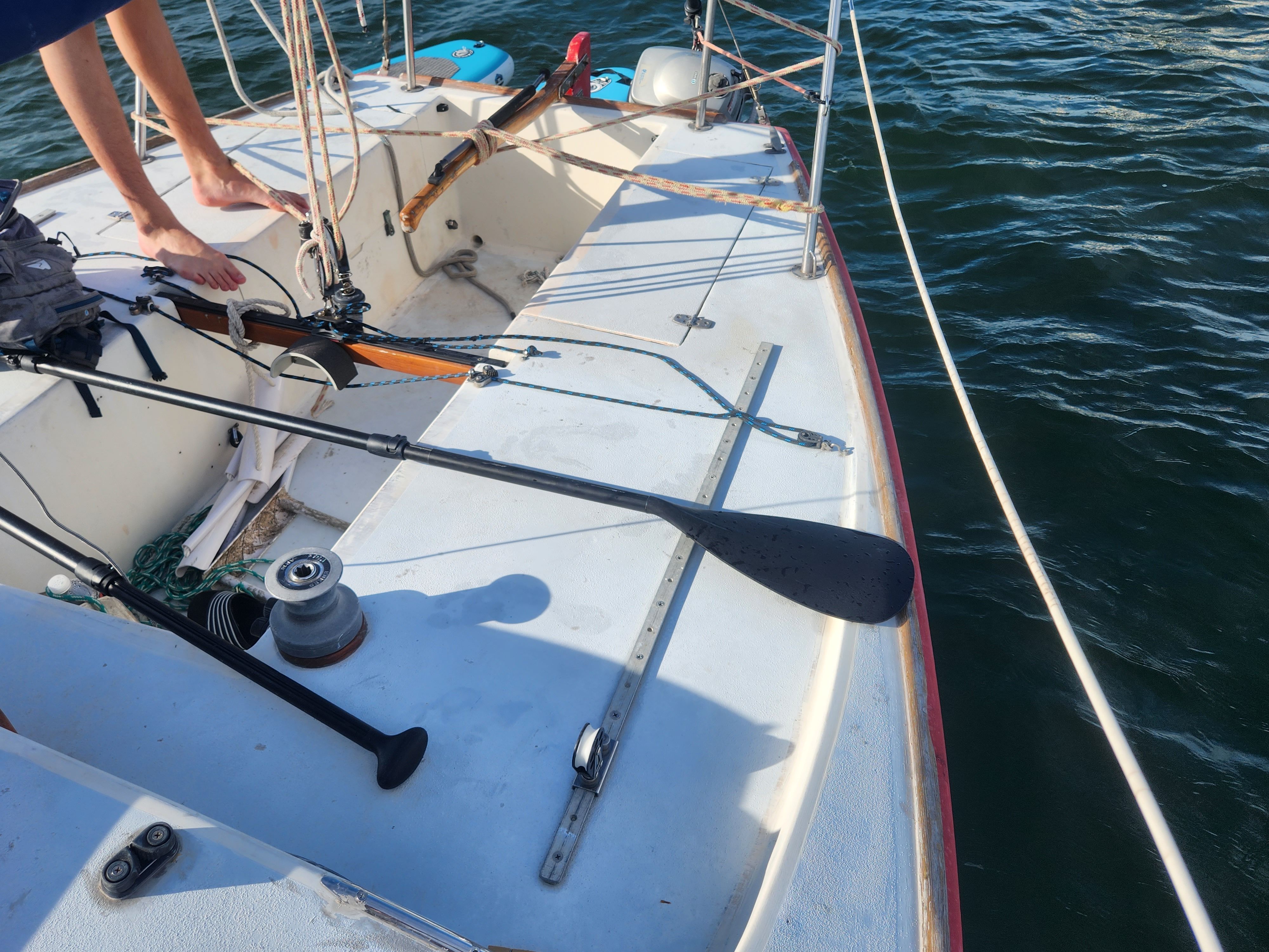 1978 J/24 sailboat on water, deck view.