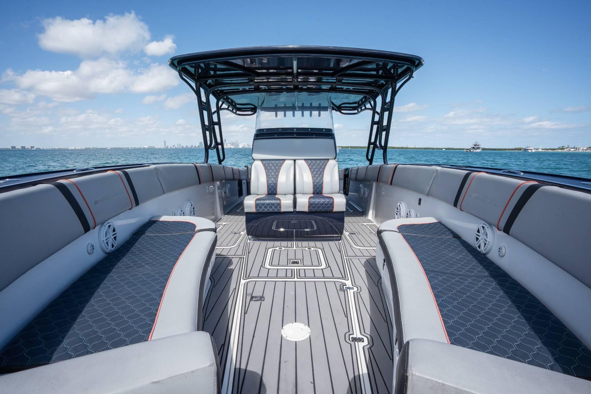 2014 Midnight Express 37 Open boat interior with sleek seating and ocean view.