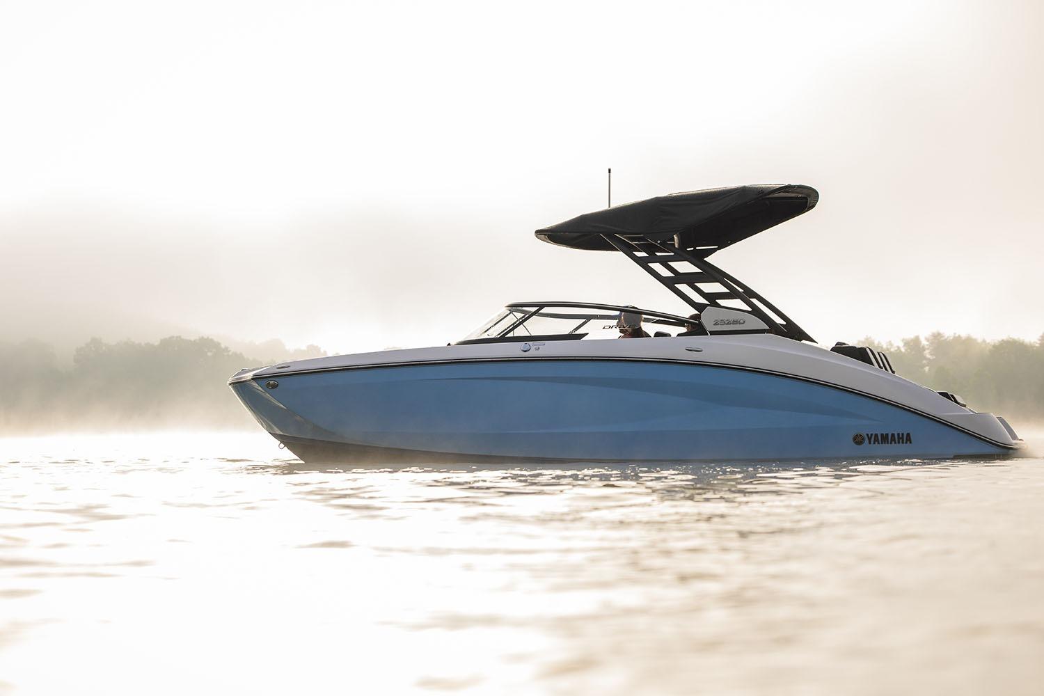 Manufacturer Provided Image: 2026 Yamaha Boats 252SD on calm water, sleek design, misty background.