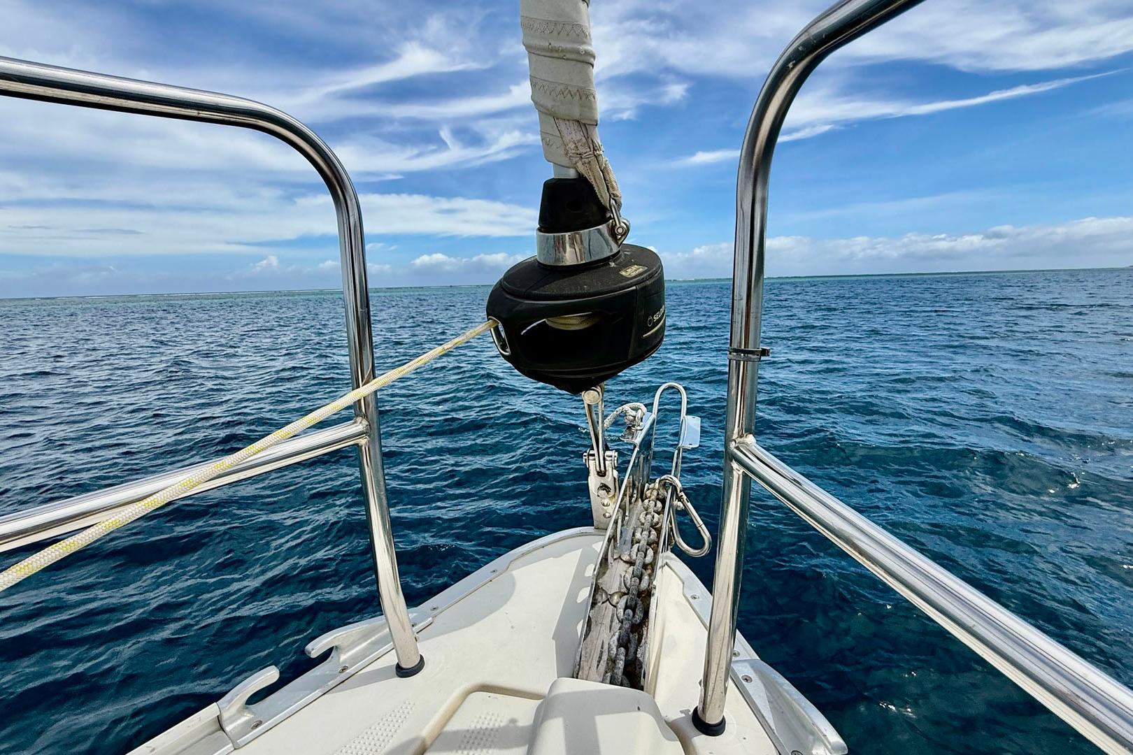 Bavaria Cruiser 41S sailboat bow on open sea, 2017 model, under clear blue sky.