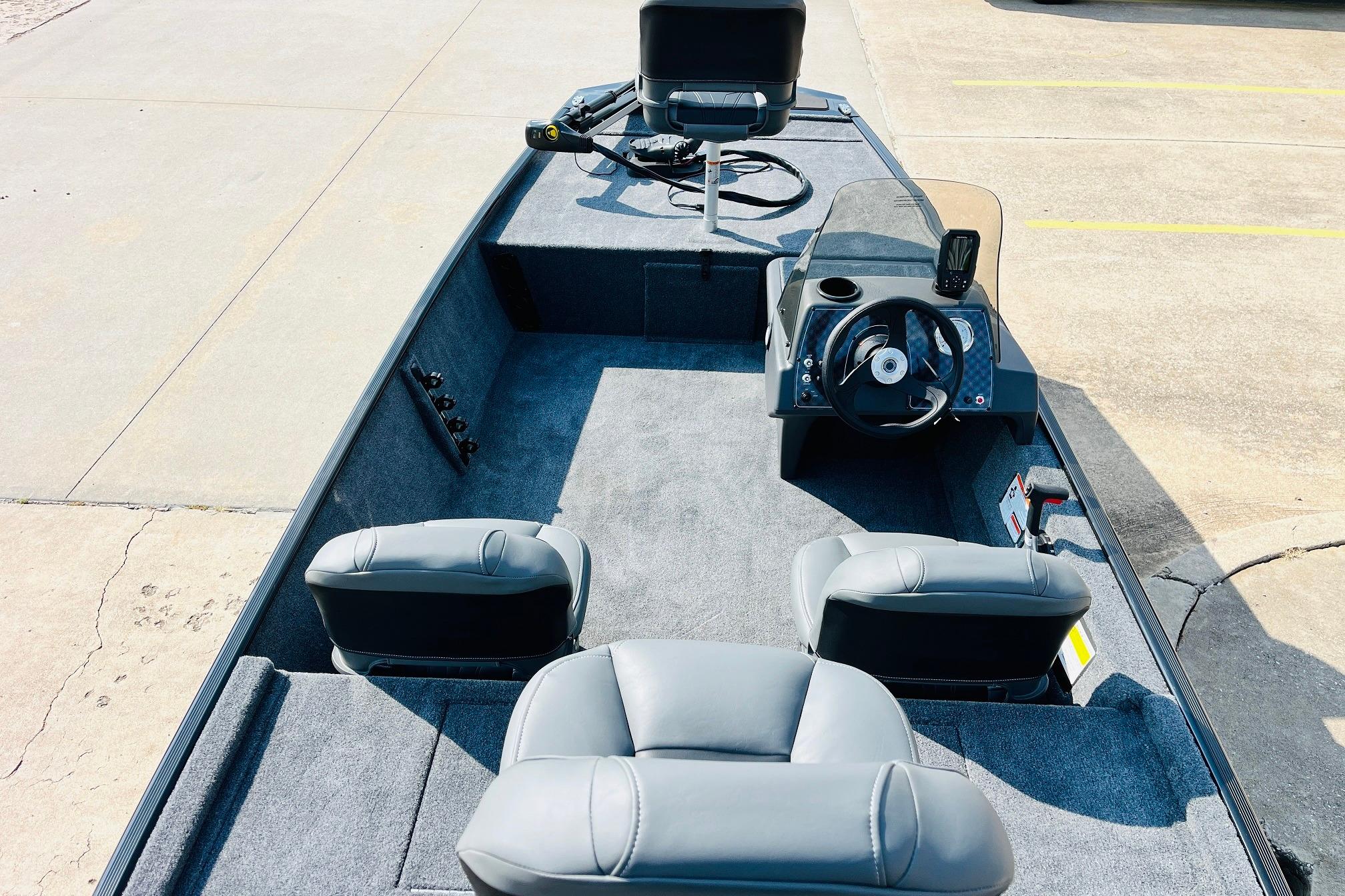 2026 Tracker Bass Tracker Classic XL boat interior with steering console and seating.