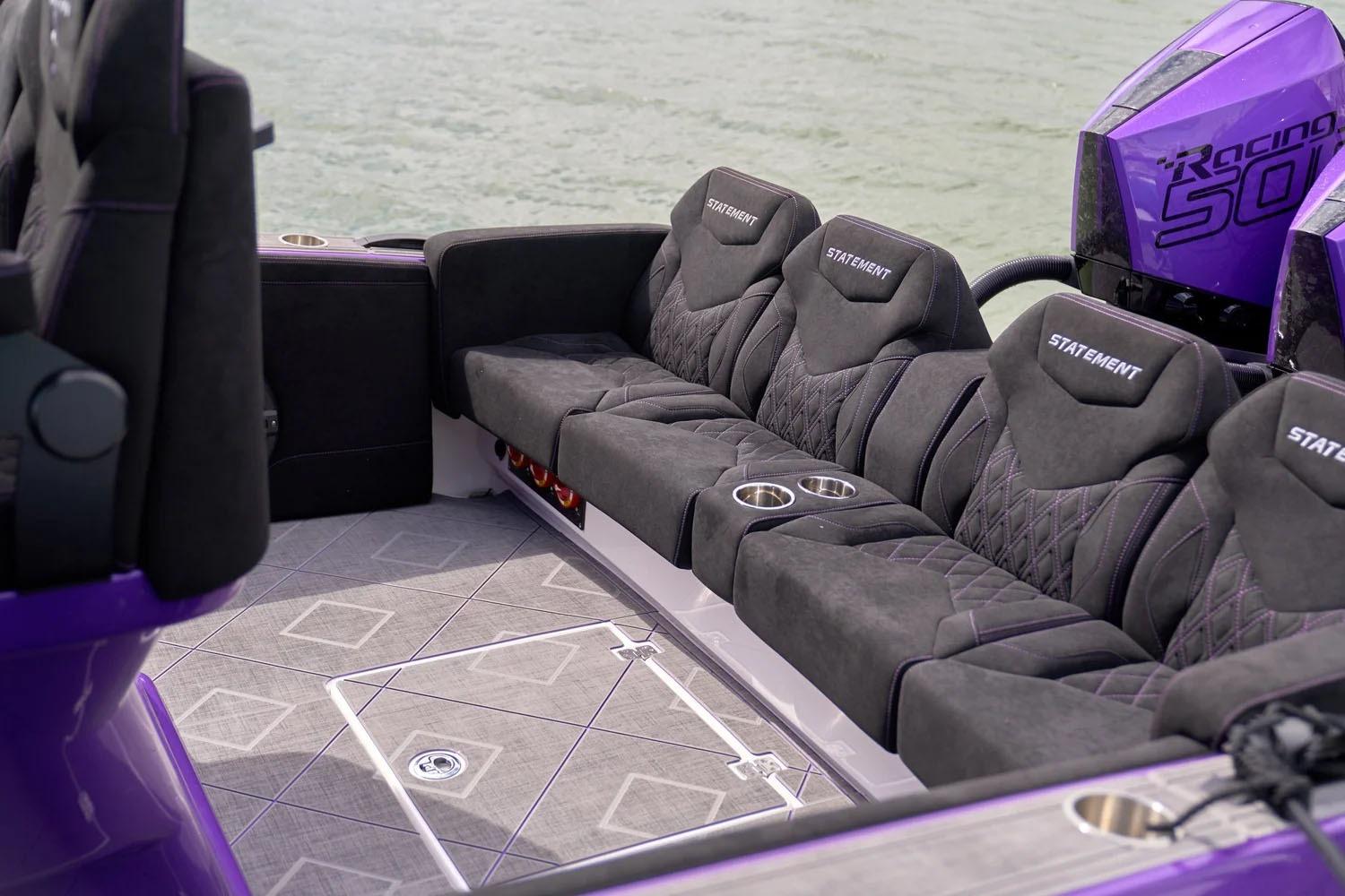 Manufacturer Provided Image: Luxurious seating on 2026 Statement 380 Open boat with purple accents and Racing 500 engine.