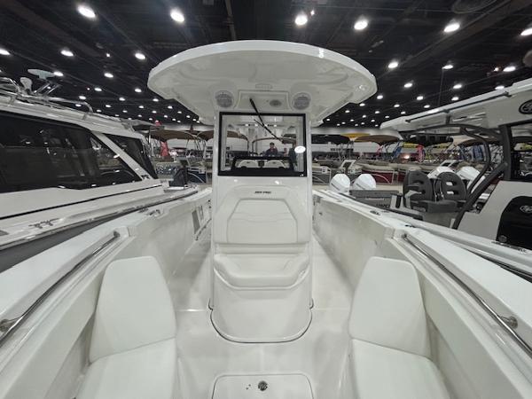2025 Sea Pro 262 Offshore boat interior at a boat show, showcasing seating and helm.