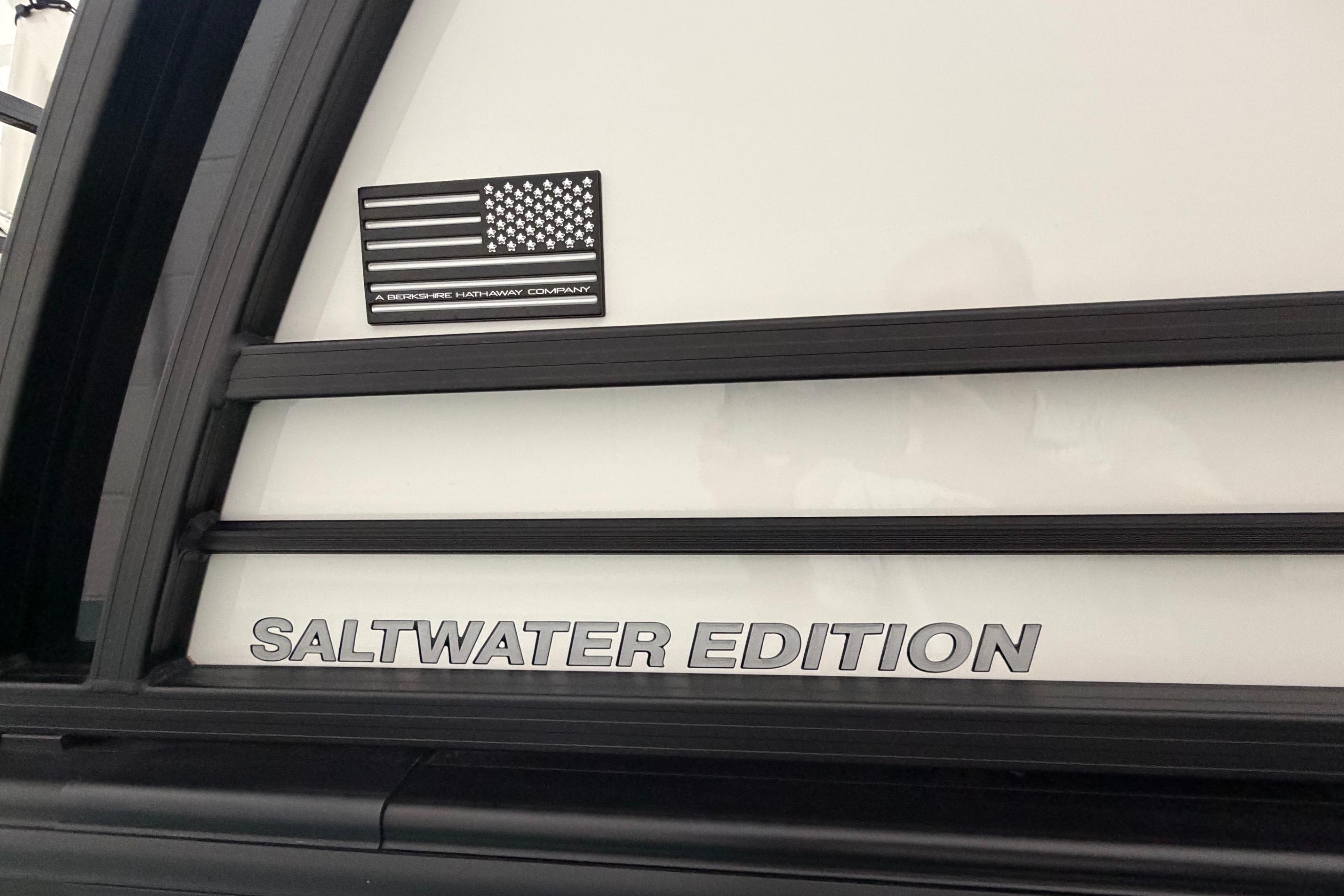 2026 South Bay 525SB2 Saltwater Edition with American flag emblem.