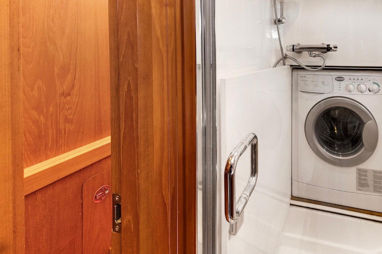 Laundry area with washing machine in 2011 Southerly 57 RS yacht.