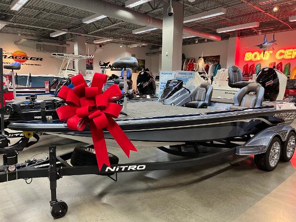 2025 Nitro Z20 XL Pro boat with red bow in showroom.
