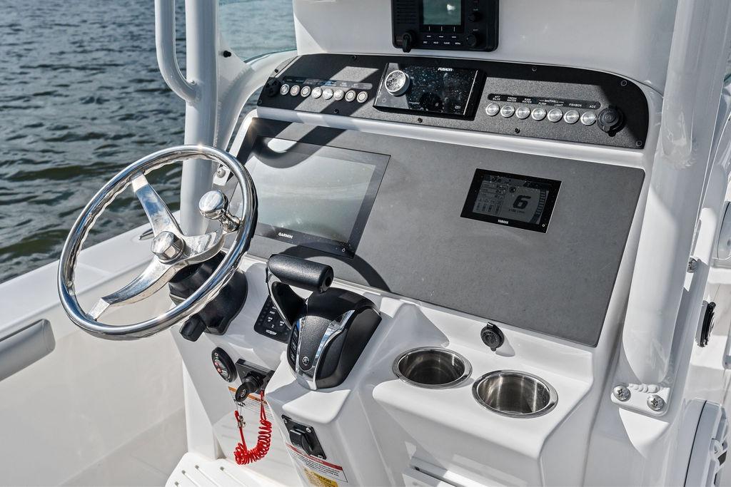 Steering console of 2023 Everglades 243 Center Console boat with modern controls.