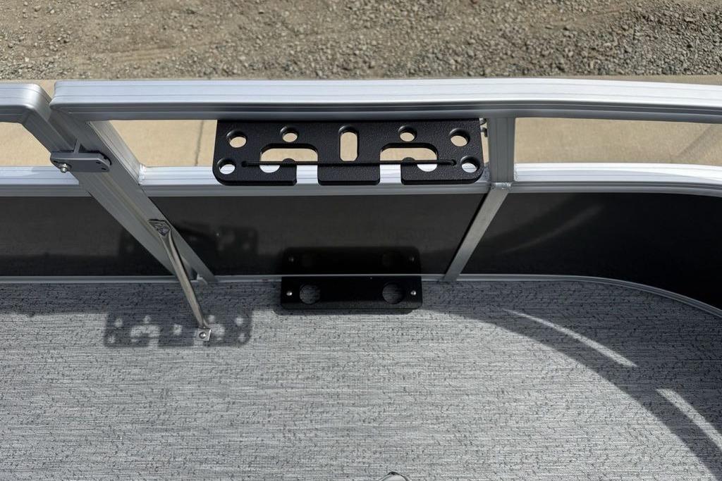 2026 Sun Tracker Bass Buggy 16 XL Select boat interior with metal railing and mounting bracket.