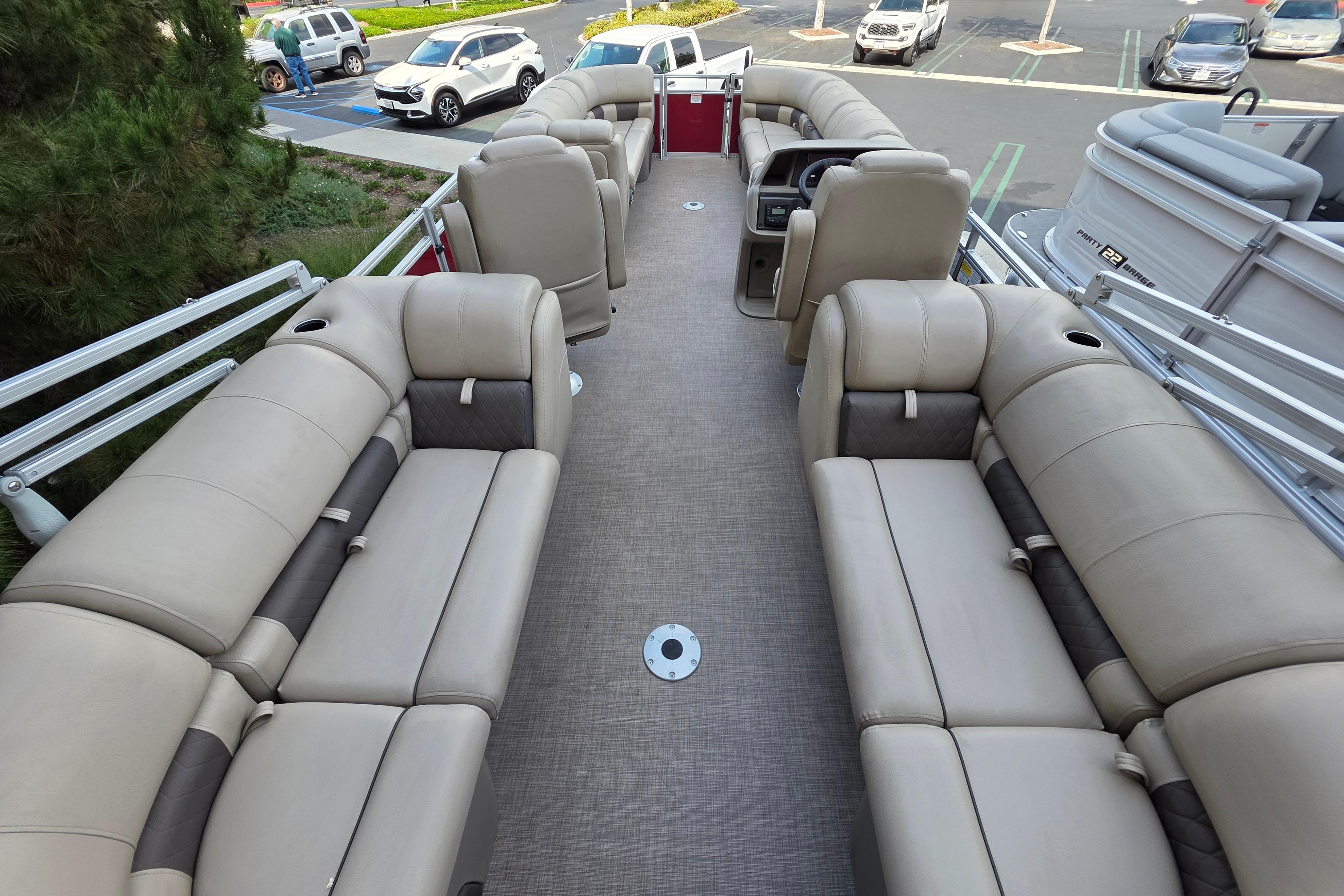 2025 Sun Tracker Party Barge 24 DLX with spacious seating and modern design.
