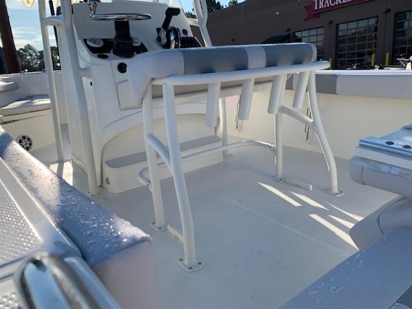2024 Mako 214 CC center console boat interior with seating and controls.
