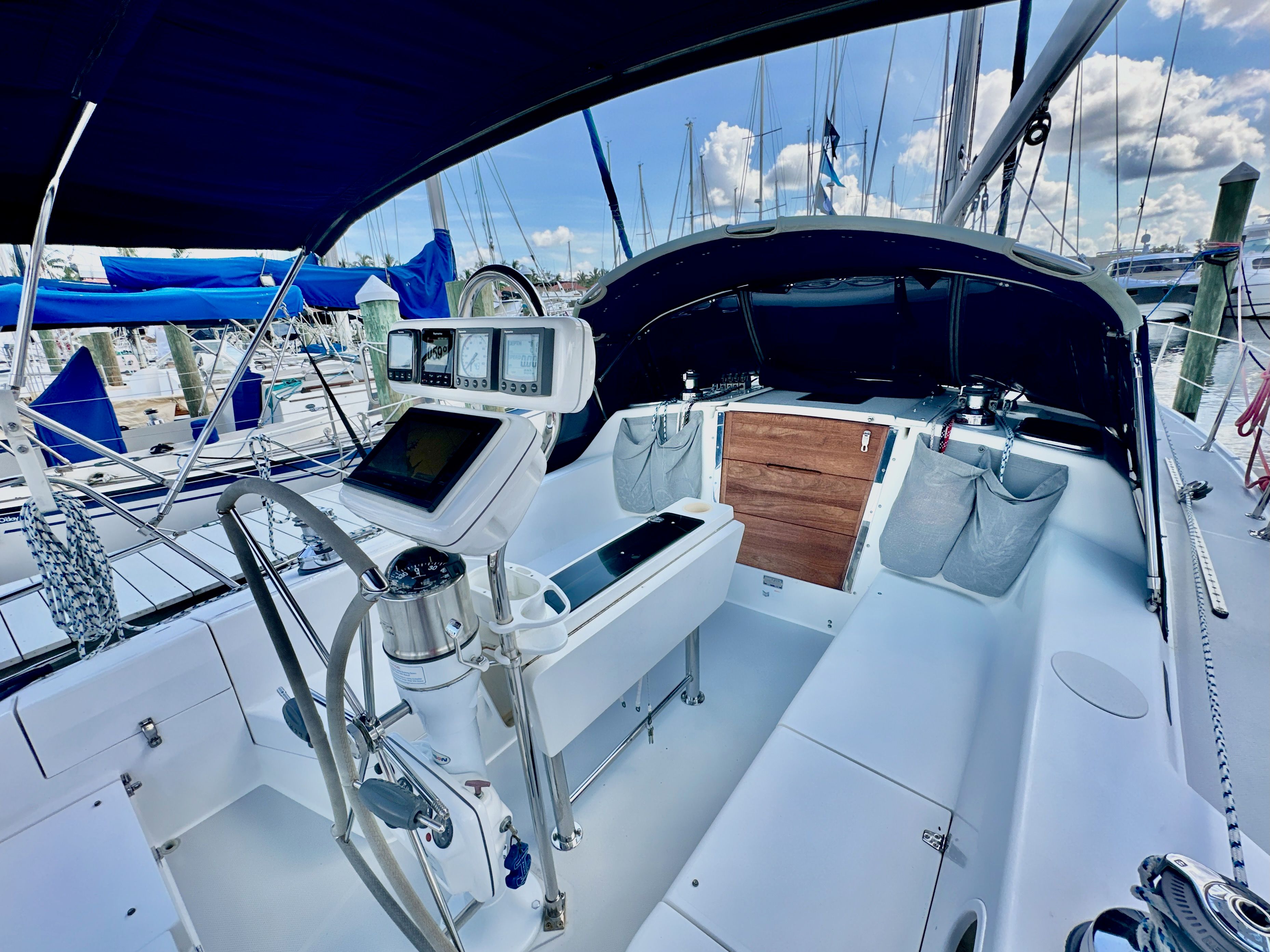Cockpit of 2005 Catalina 36 sailboat with navigation equipment and seating.