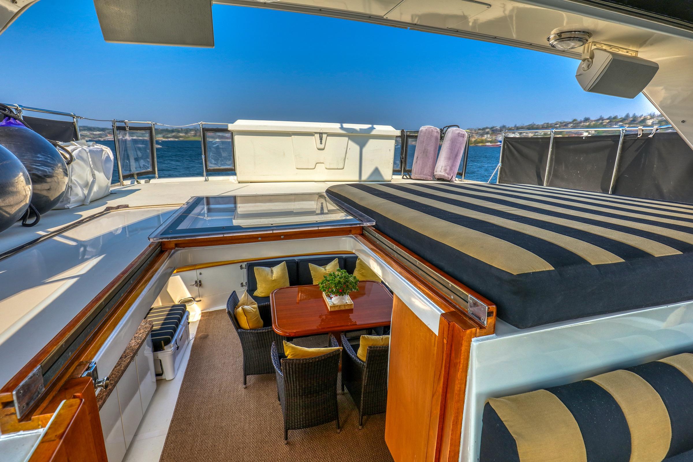 1987 Ocean Alexander 480 Sport Sedan yacht with elegant interior and scenic ocean view.