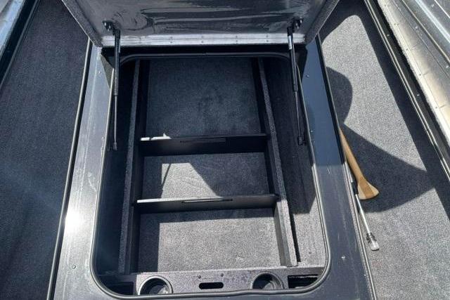 Open storage compartment in 2023 Tracker Pro Team 190 TX Tournament Edition boat.