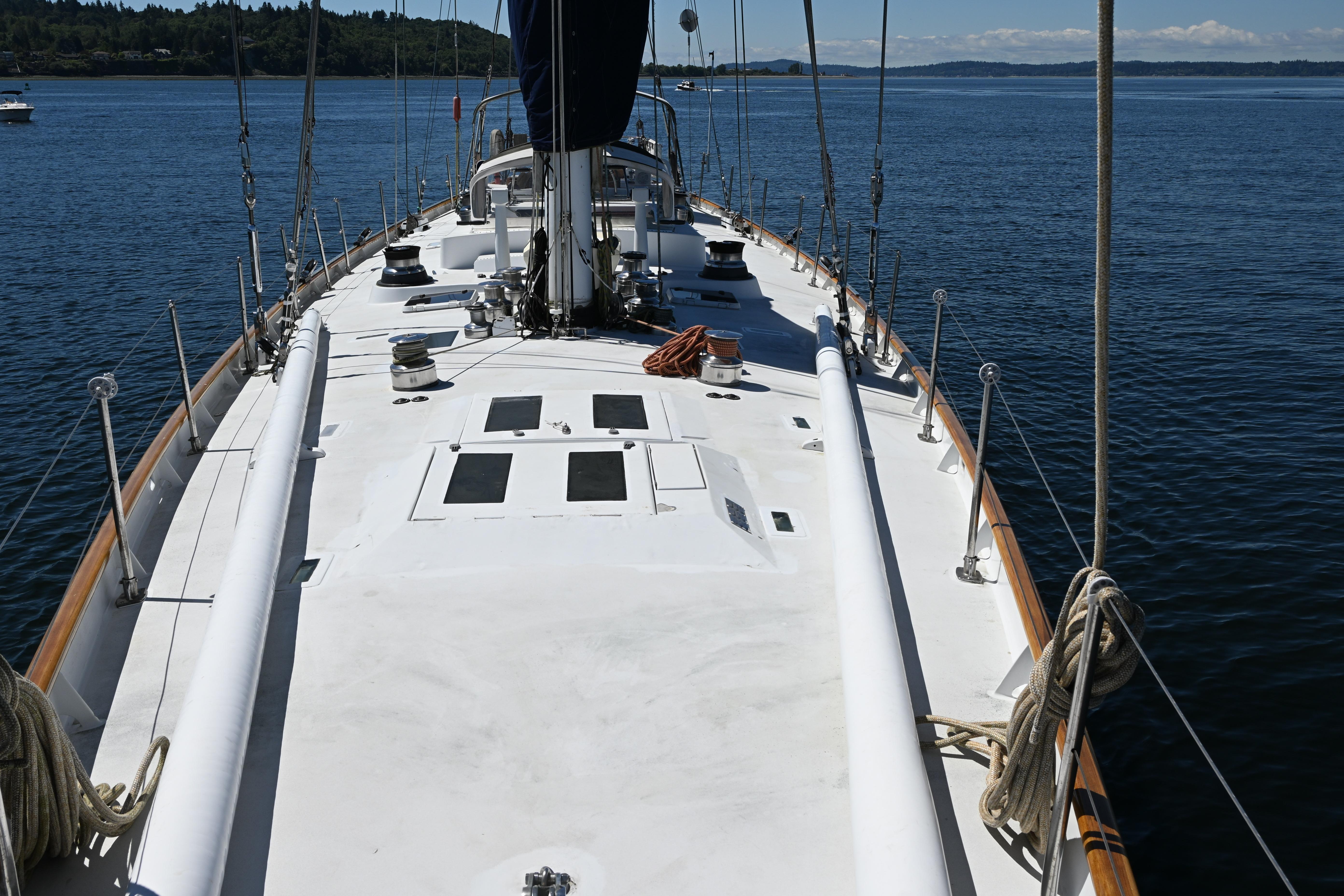 Sailing yacht Abeking & Rasmussen Tripp 74, 1968 model, on calm waters.