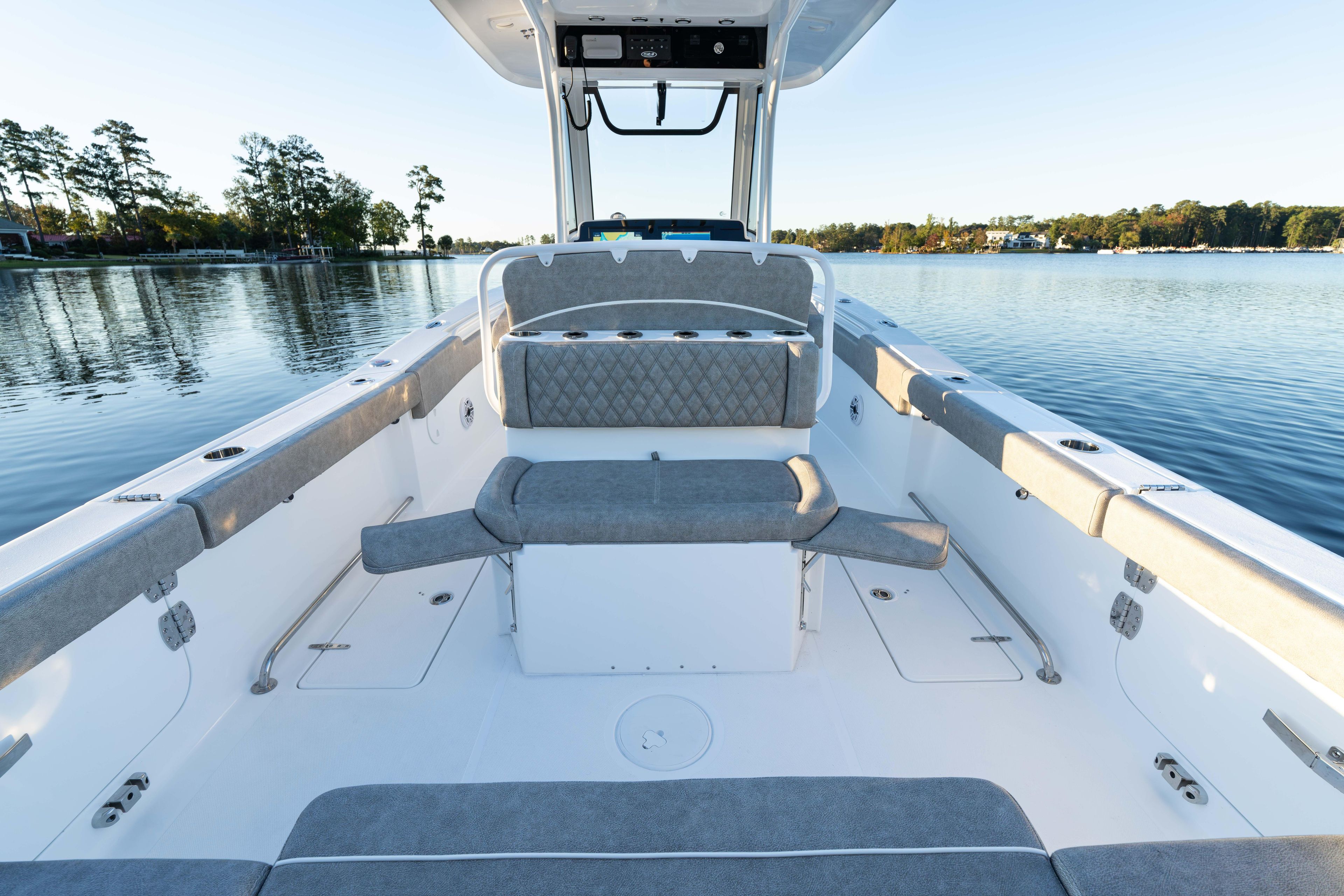 2026 Sea Hunt Ultra 275 Coffin Box boat interior on a serene lake.