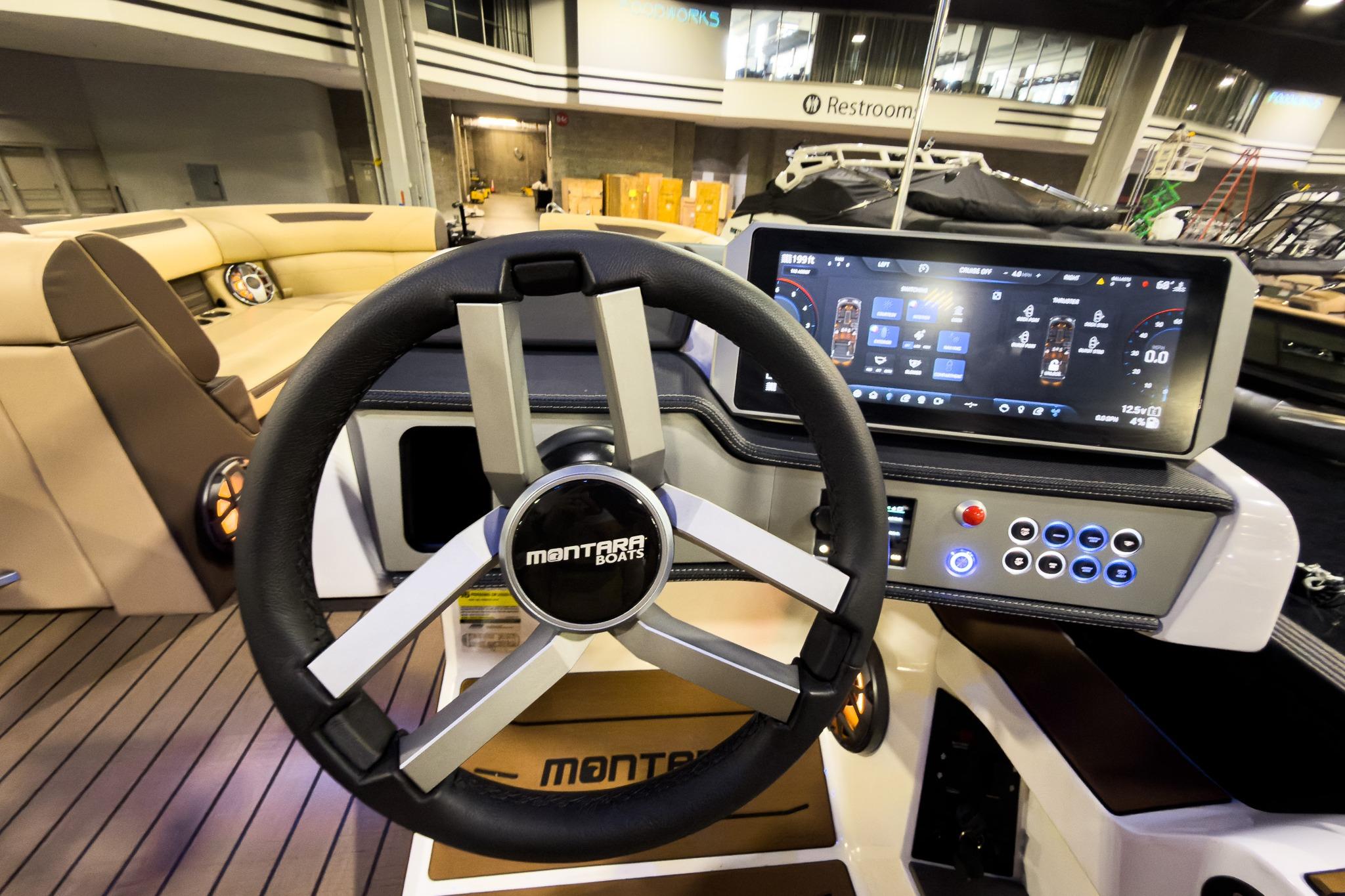 Steering wheel and dashboard of 2026 Montara Surf Boss EVO - SLDH 25' boat.
