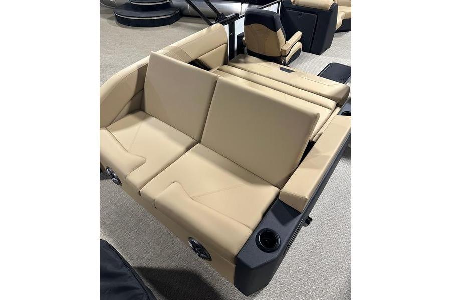 2026 Evotti 523CS boat interior with beige seating and cup holders.