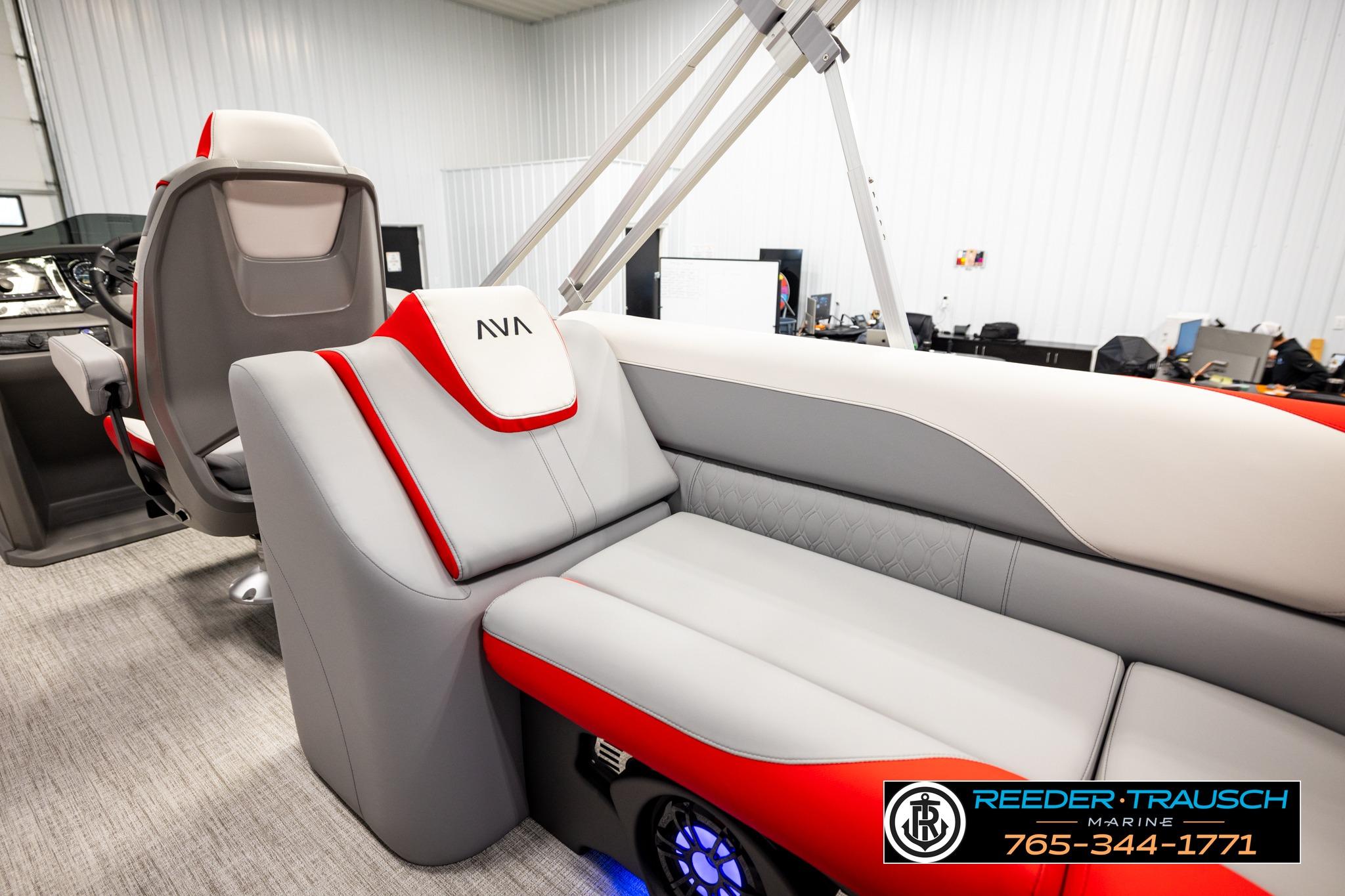 2026 Avalon LSZ QL boat interior with red and gray seating, showcased by Reeder-Trausch Marine.