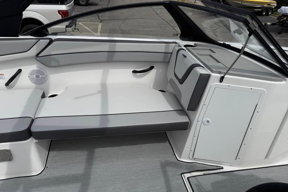 2026 Yamaha Boats AR220 interior seating with gray and white upholstery.