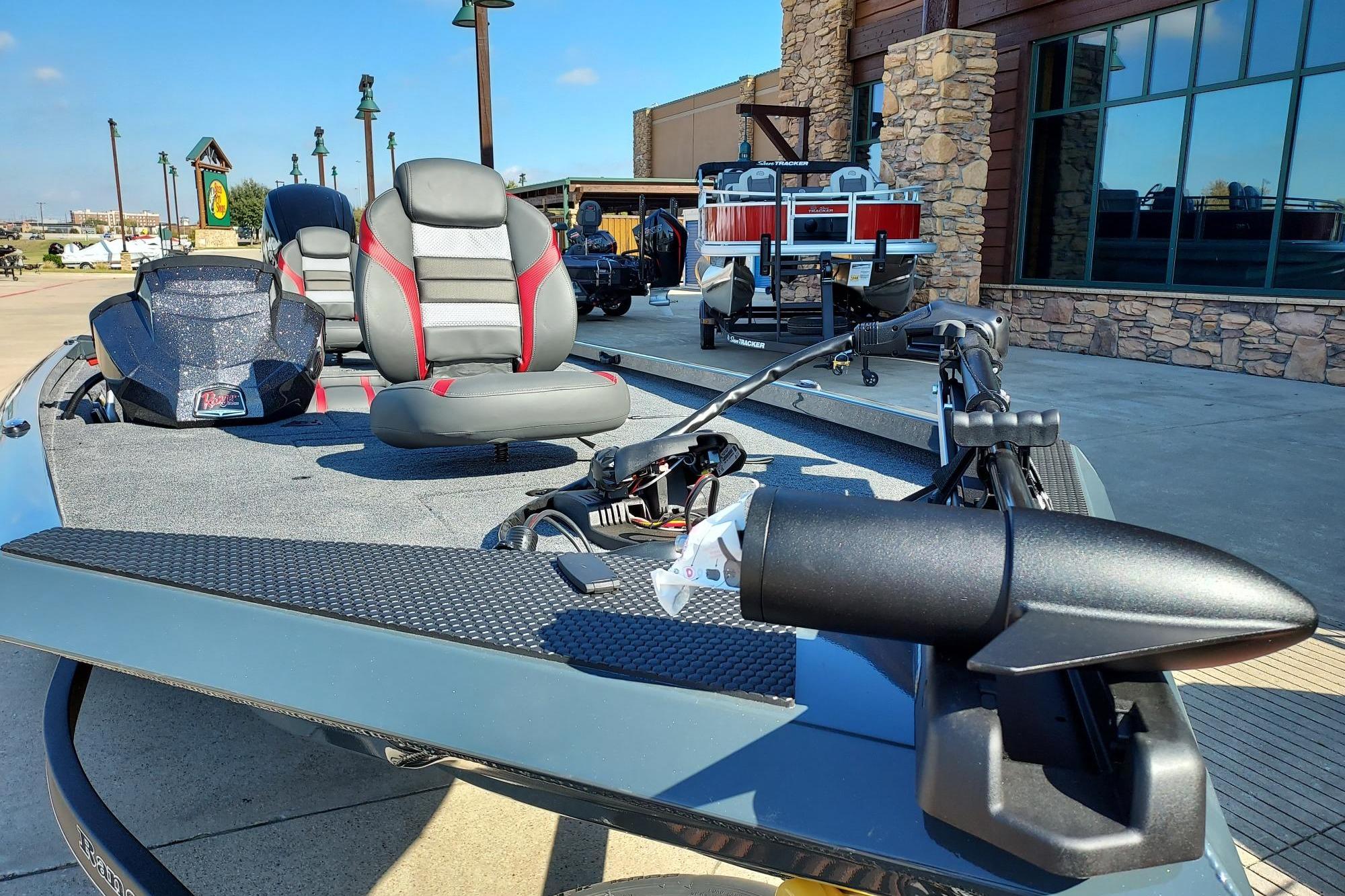 2026 Ranger RT178C fishing boat with modern seating and equipment, displayed outdoors.