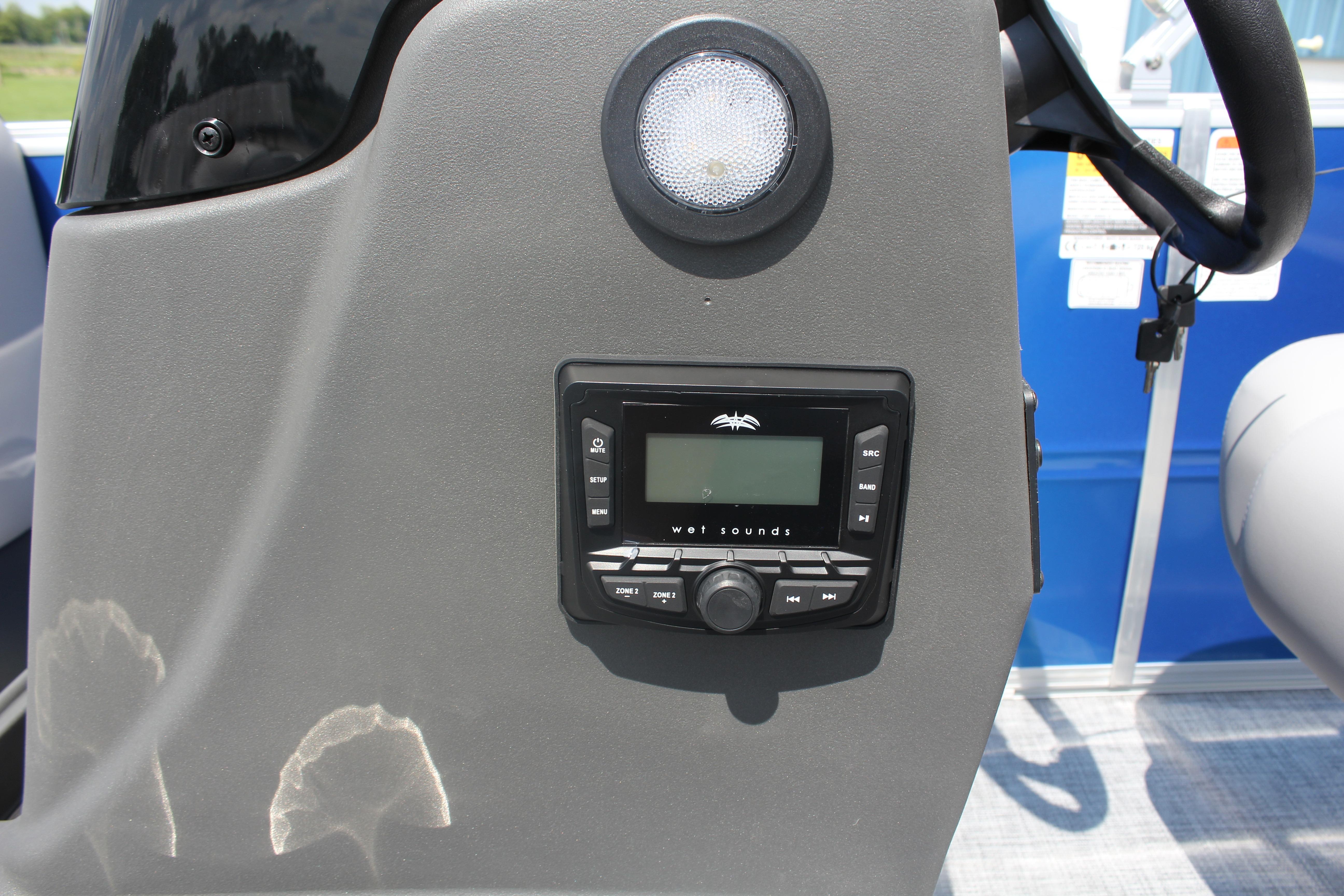 Control panel of 2026 Sun Tracker Party Barge 16 DLX with audio system.